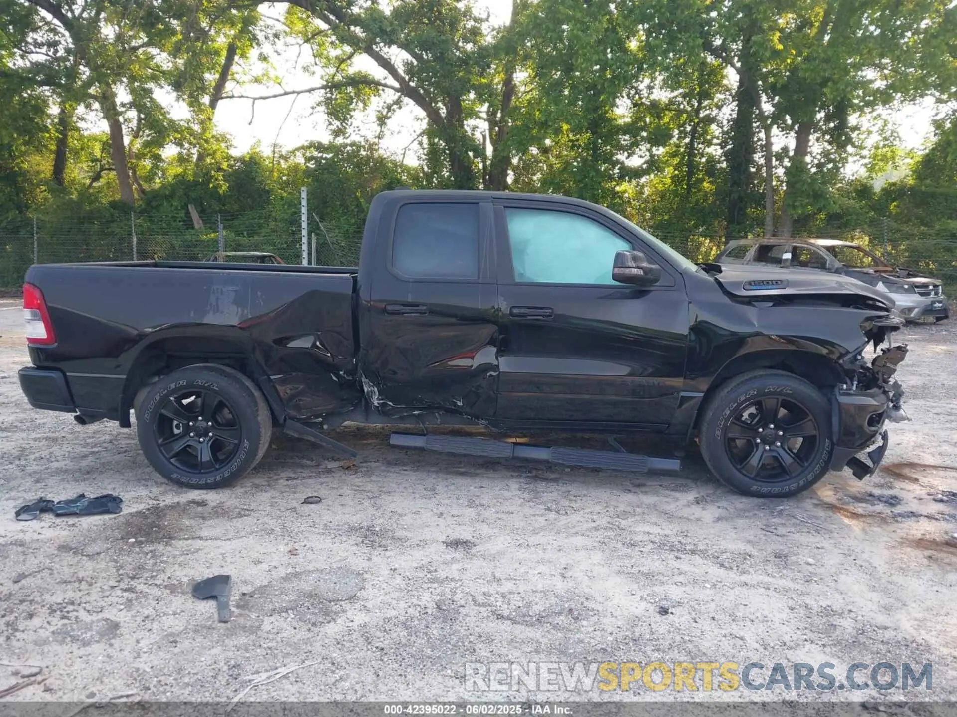 13 Photograph of a damaged car 1C6RREBG8PN604579 RAM 1500 2023