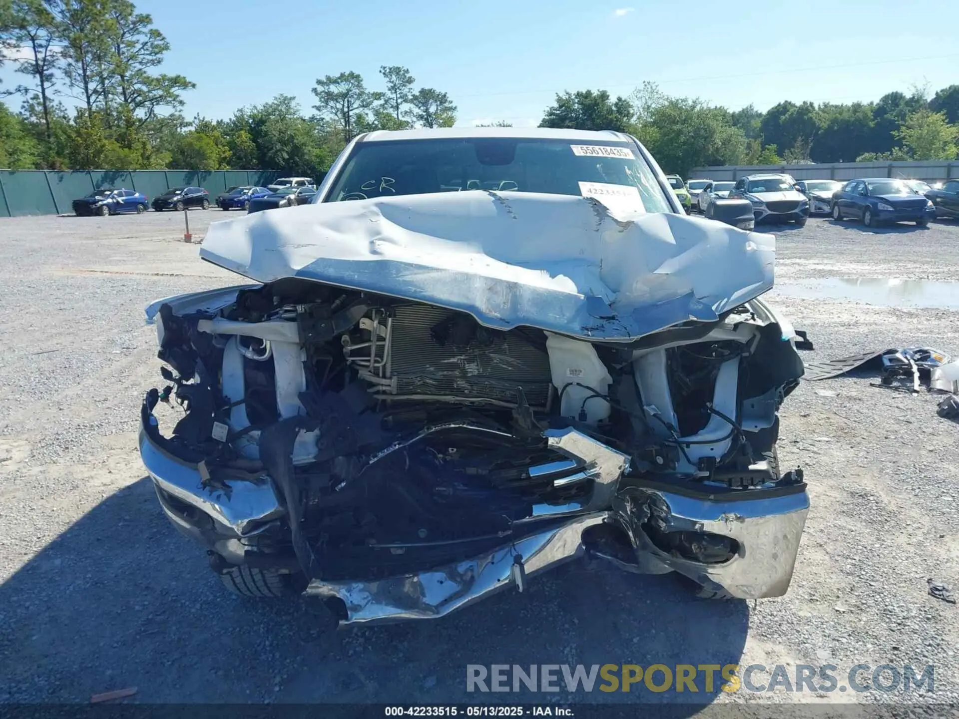 12 Photograph of a damaged car 1C6RREBG9PN511828 RAM 1500 2023