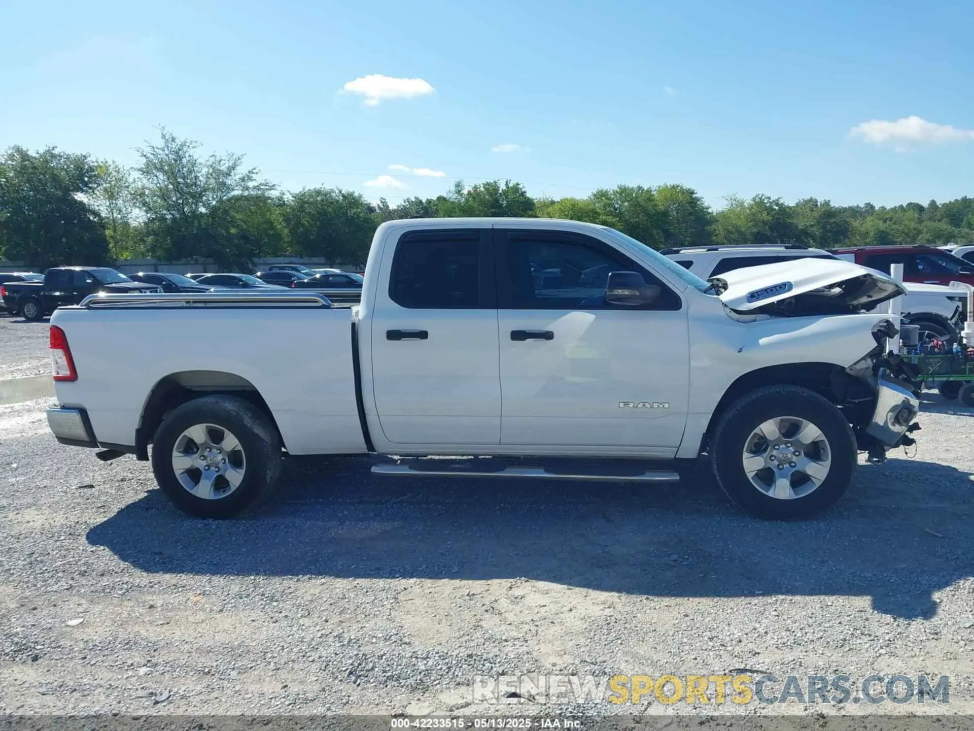 13 Photograph of a damaged car 1C6RREBG9PN511828 RAM 1500 2023