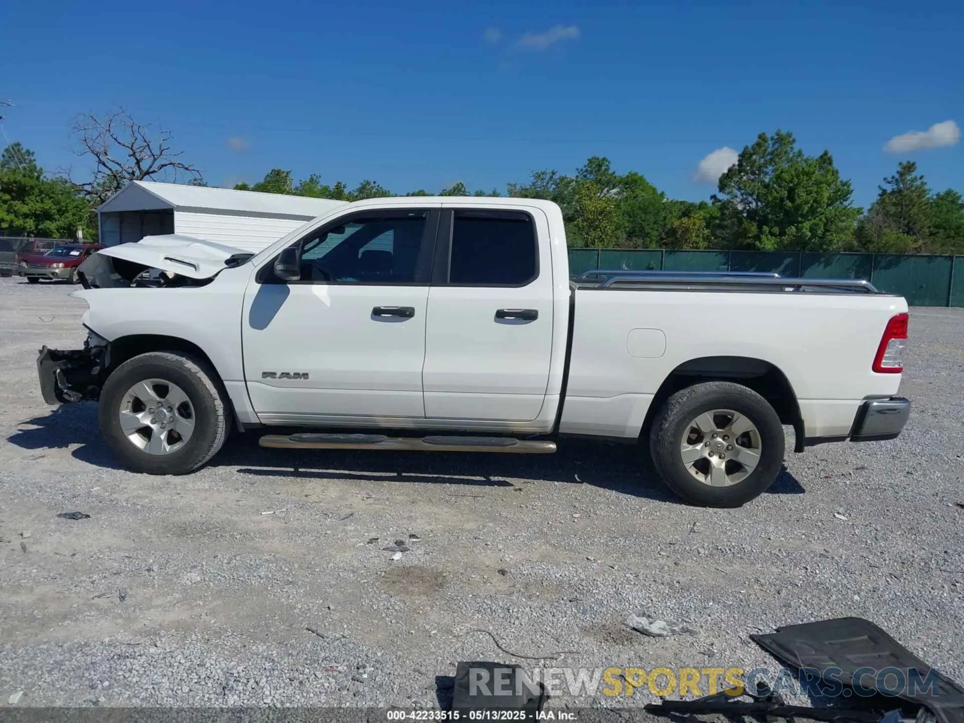 14 Photograph of a damaged car 1C6RREBG9PN511828 RAM 1500 2023