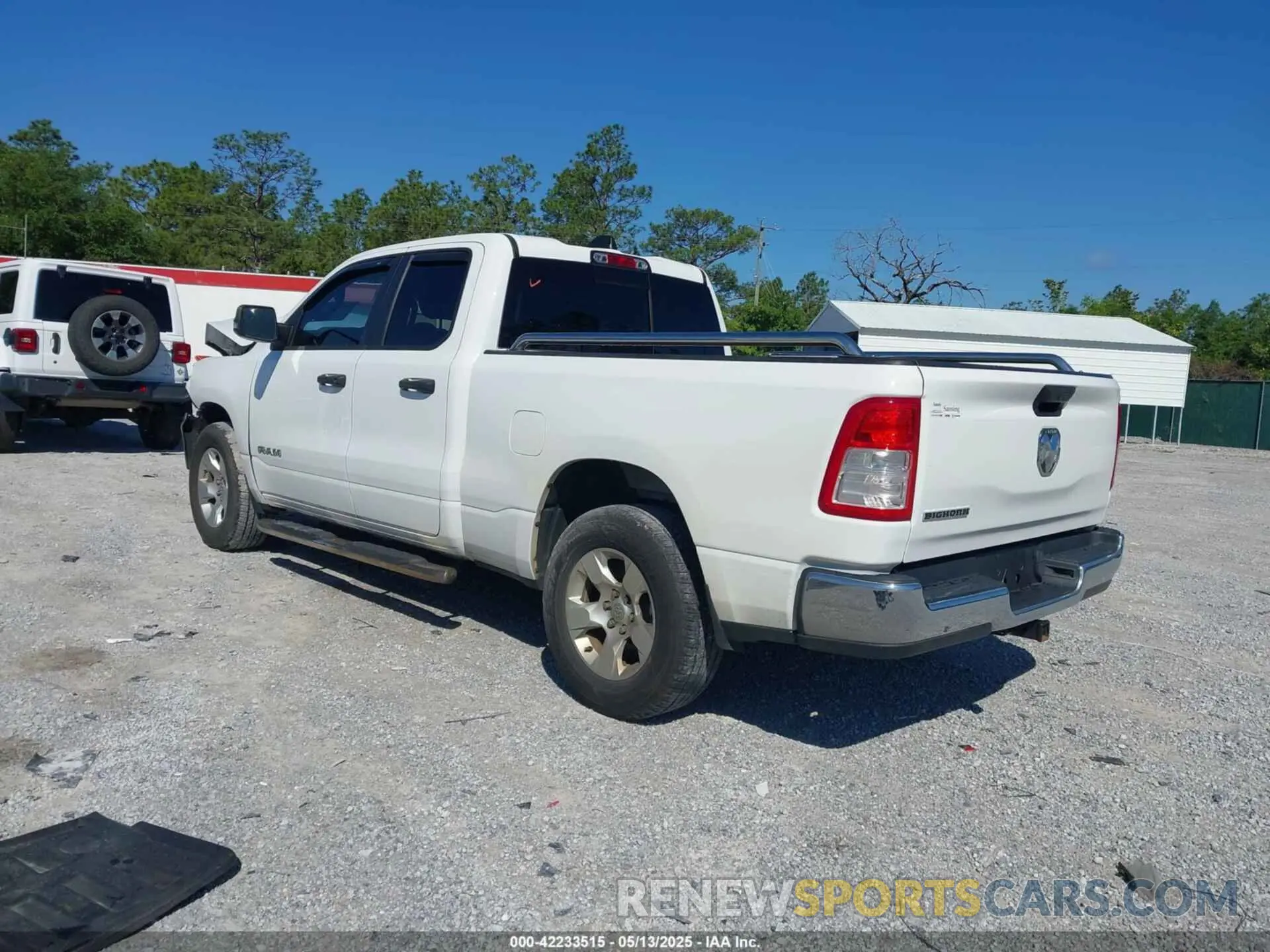 3 Photograph of a damaged car 1C6RREBG9PN511828 RAM 1500 2023