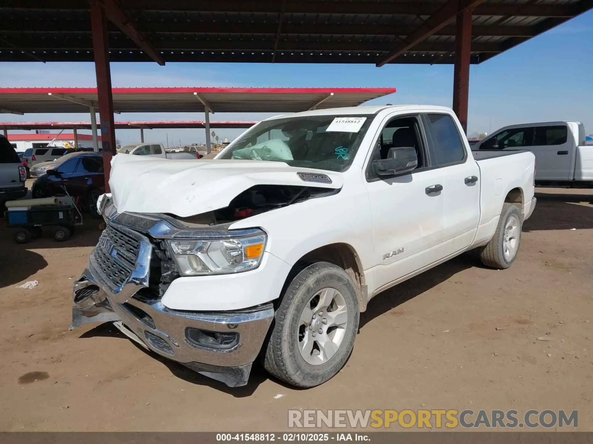 2 Photograph of a damaged car 1C6RREBG9PN511845 RAM 1500 2023
