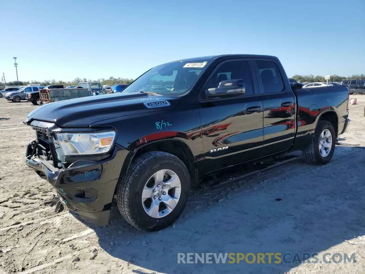 1 Photograph of a damaged car 1C6RREBT1PN553326 RAM 1500 2023