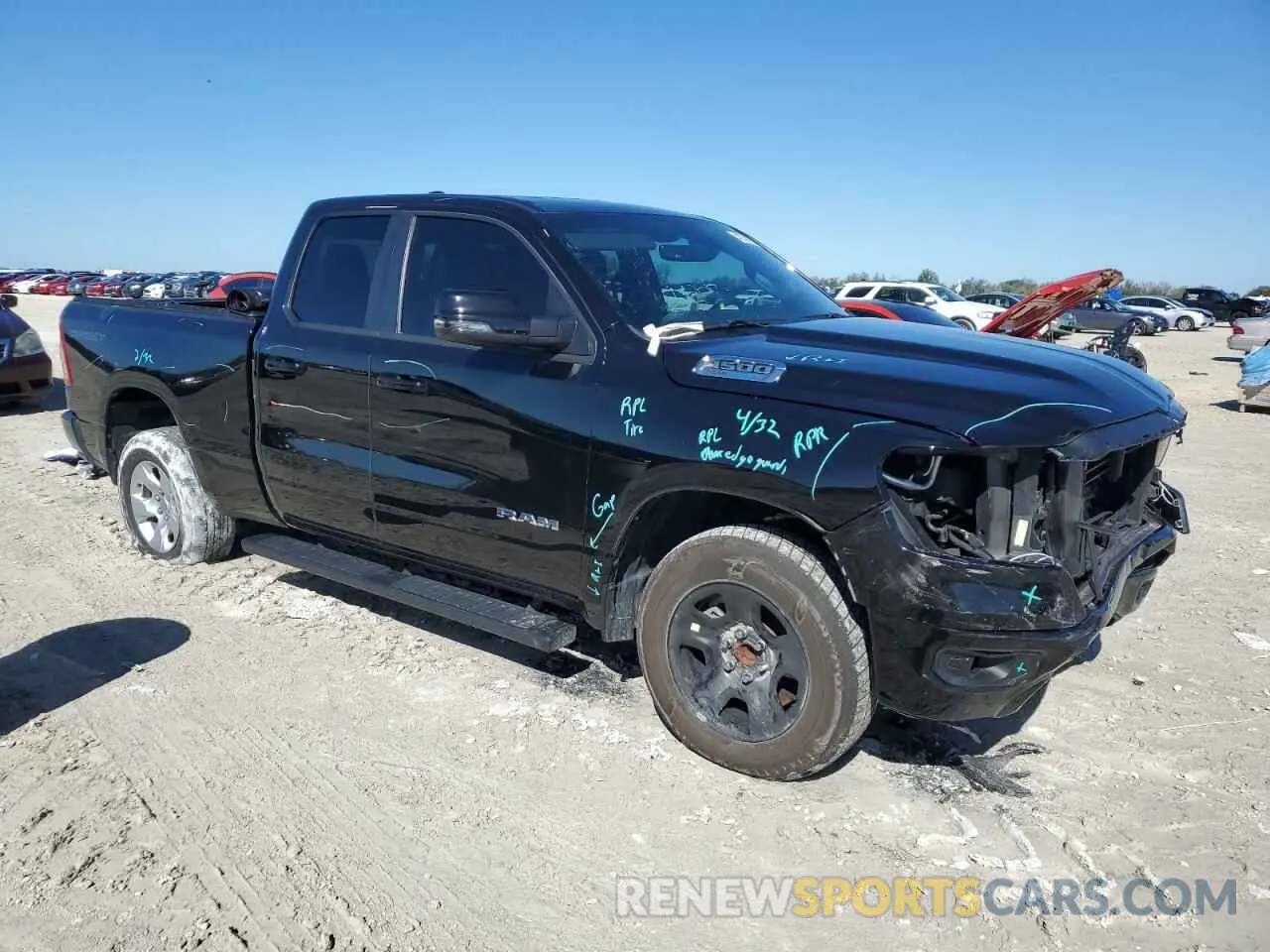 4 Photograph of a damaged car 1C6RREBT1PN553326 RAM 1500 2023