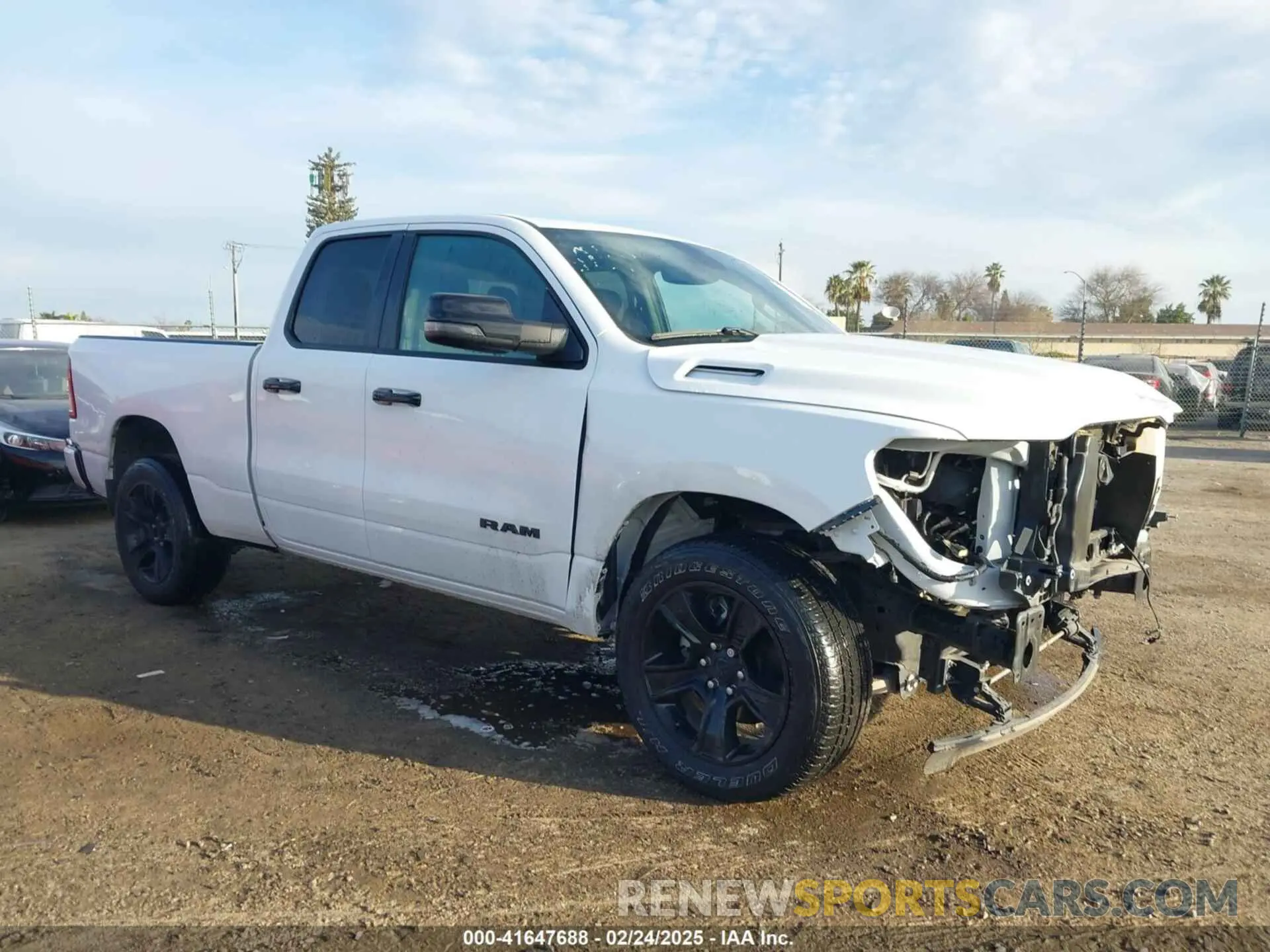 14 Photograph of a damaged car 1C6RREBT8PN553095 RAM 1500 2023