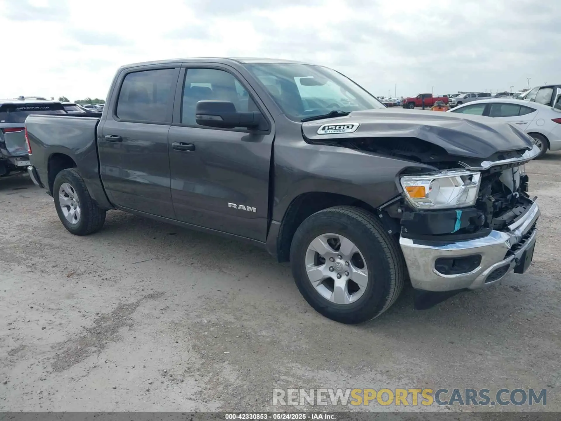 1 Photograph of a damaged car 1C6RREFG1PN600402 RAM 1500 2023