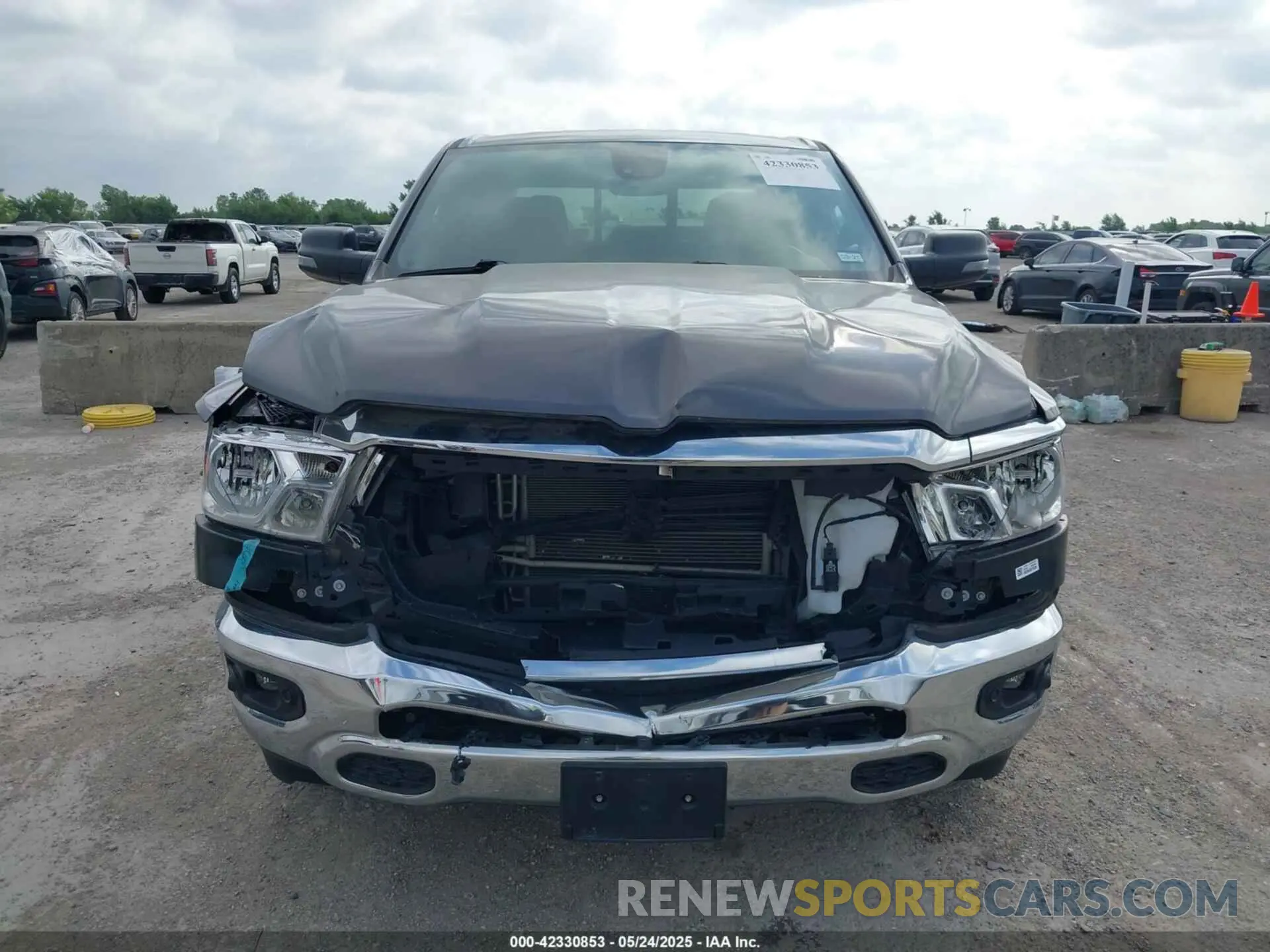 12 Photograph of a damaged car 1C6RREFG1PN600402 RAM 1500 2023