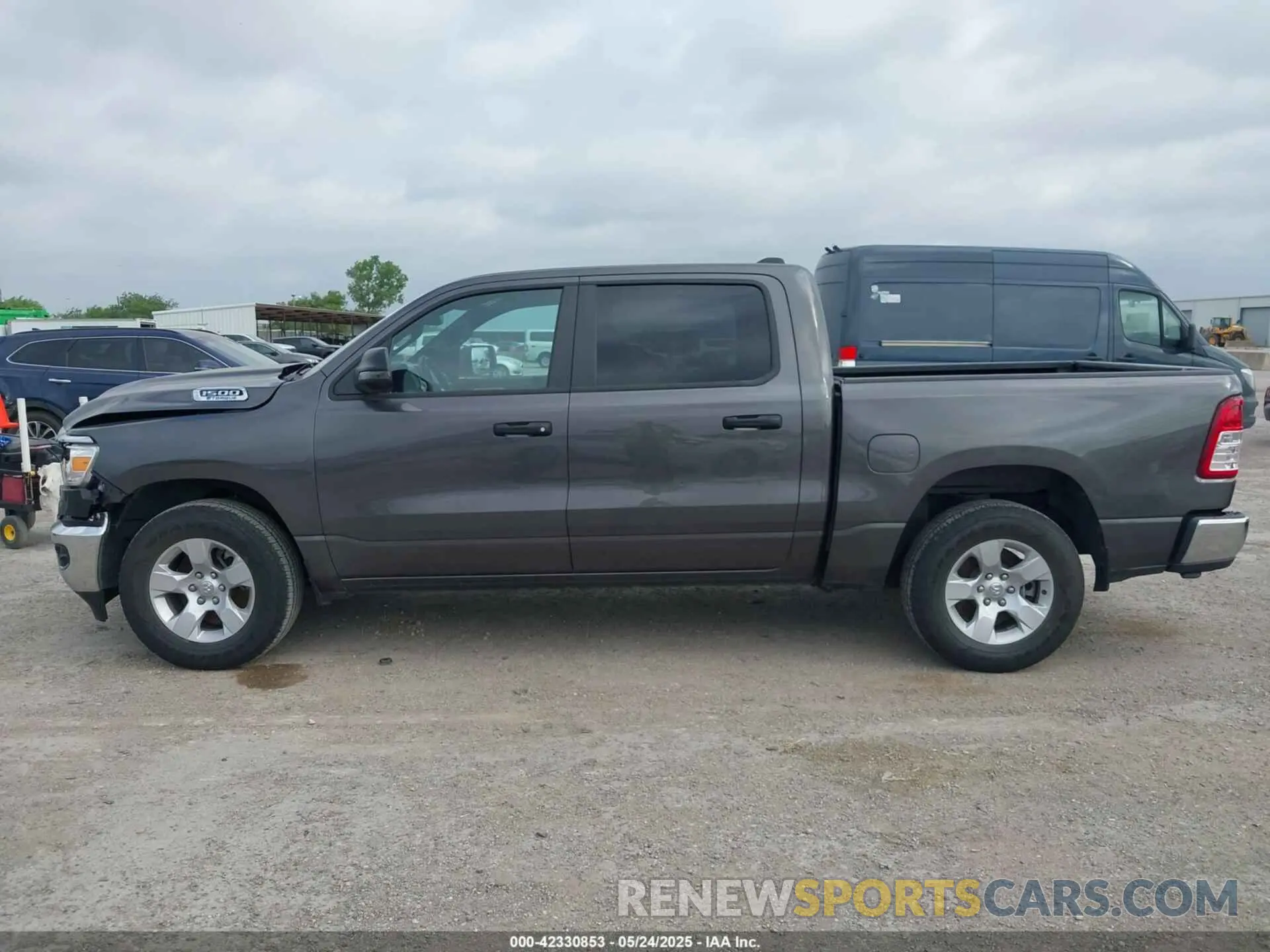 14 Photograph of a damaged car 1C6RREFG1PN600402 RAM 1500 2023