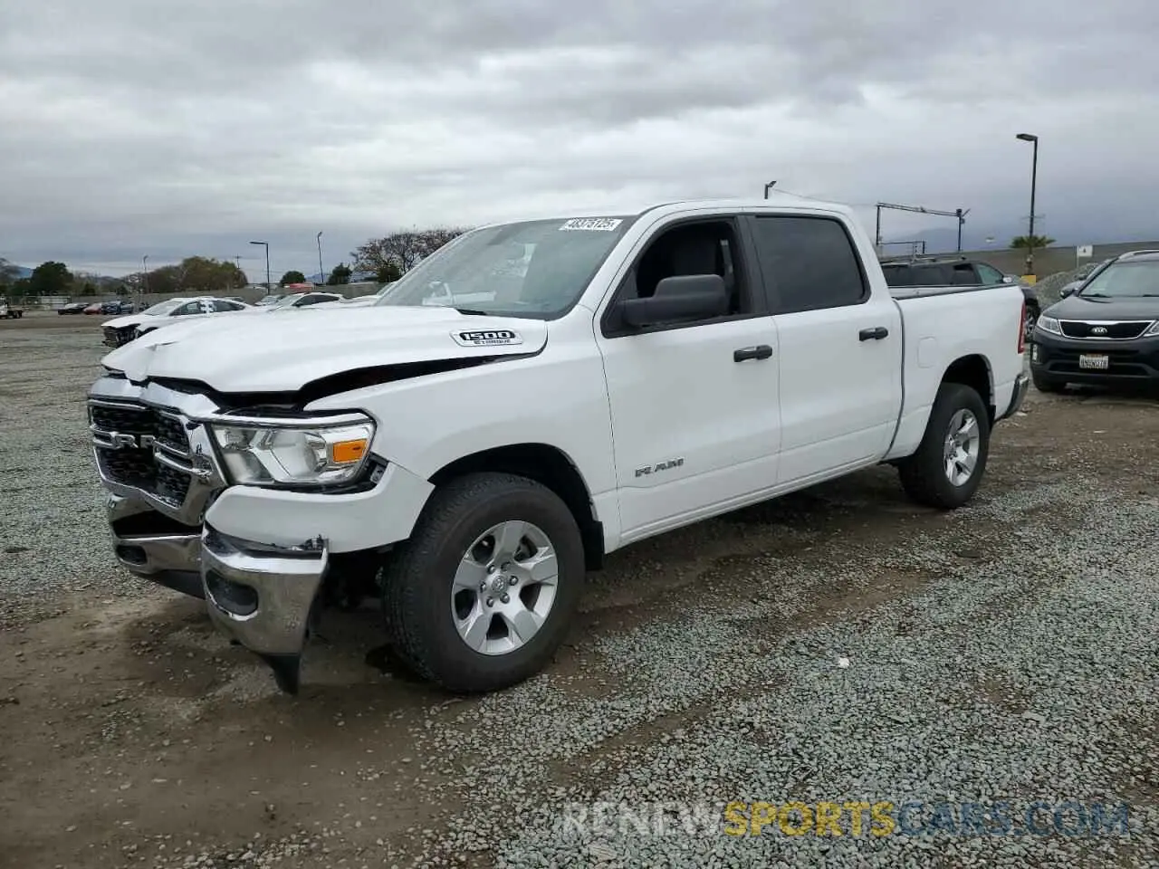 1 Photograph of a damaged car 1C6RREFG2PN607813 RAM 1500 2023