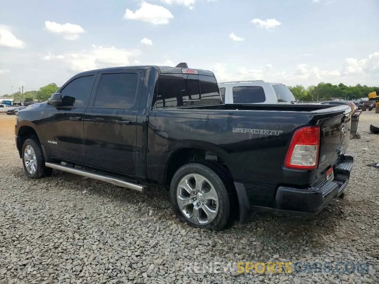 2 Photograph of a damaged car 1C6RREFG2PN677148 RAM 1500 2023