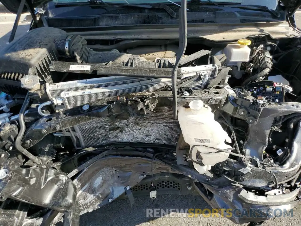 11 Photograph of a damaged car 1C6RREFT0PN686928 RAM 1500 2023