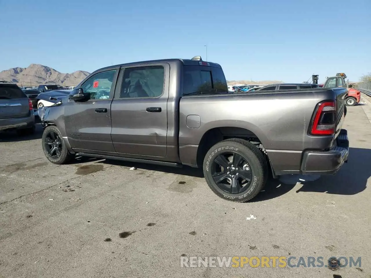 2 Photograph of a damaged car 1C6RREFT0PN686928 RAM 1500 2023
