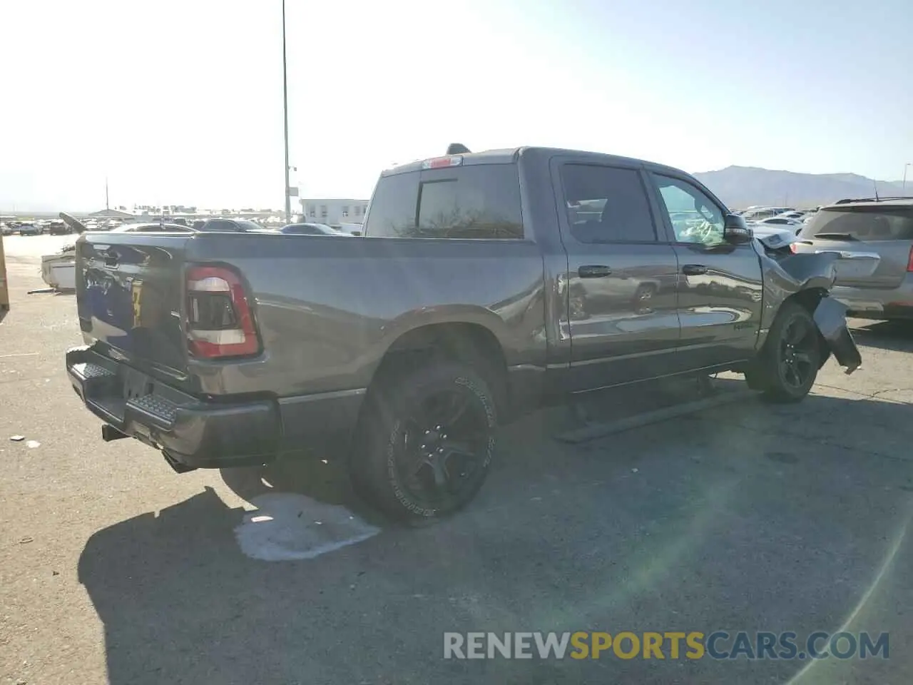 3 Photograph of a damaged car 1C6RREFT0PN686928 RAM 1500 2023