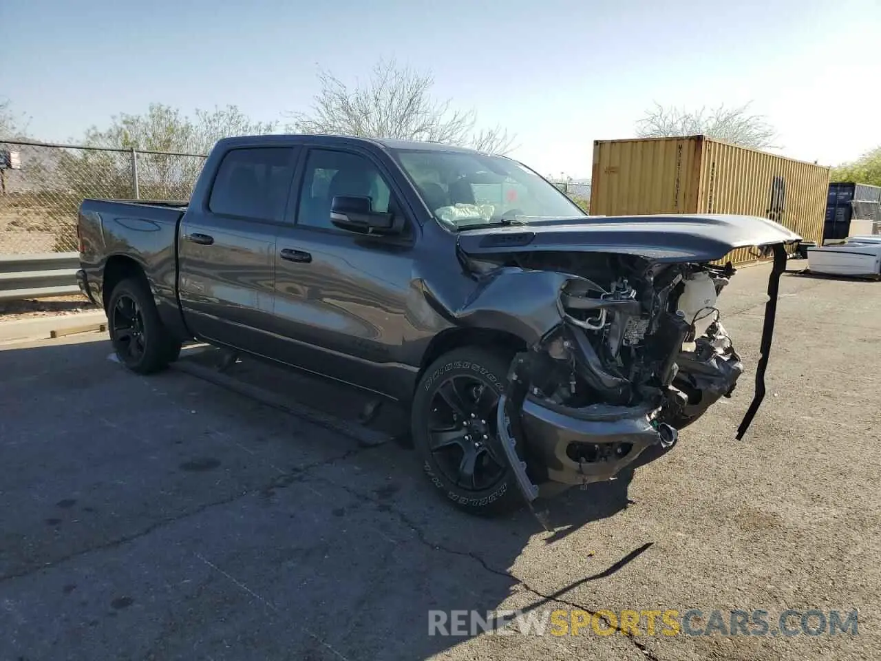 4 Photograph of a damaged car 1C6RREFT0PN686928 RAM 1500 2023