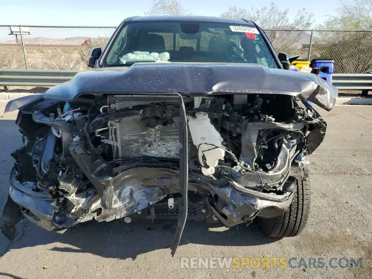 5 Photograph of a damaged car 1C6RREFT0PN686928 RAM 1500 2023