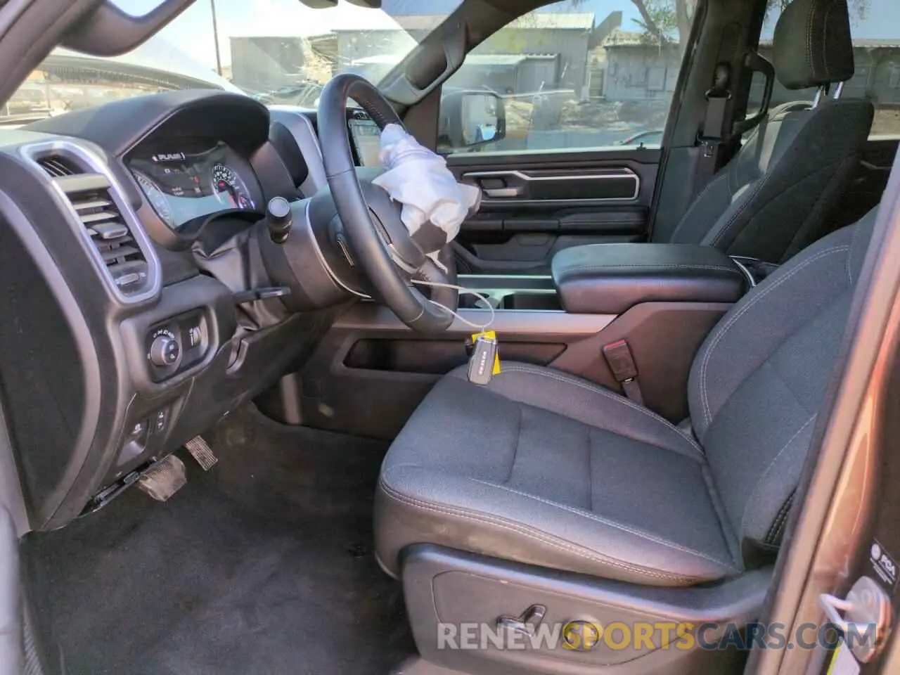 7 Photograph of a damaged car 1C6RREFT0PN694088 RAM 1500 2023