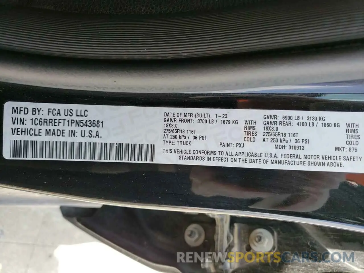 14 Photograph of a damaged car 1C6RREFT1PN543681 RAM 1500 2023
