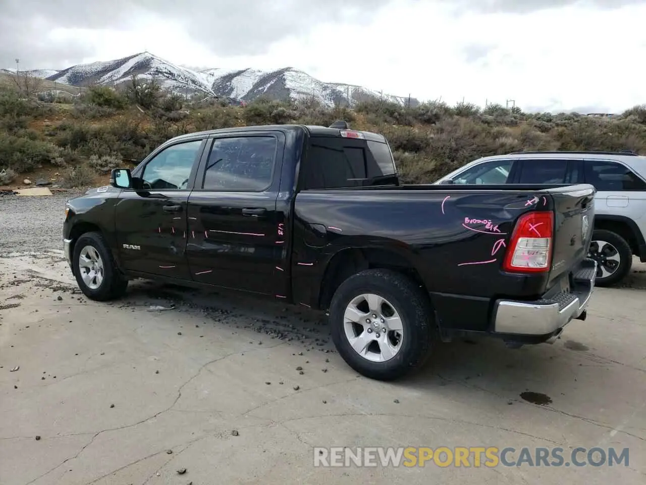 2 Photograph of a damaged car 1C6RREFT1PN543681 RAM 1500 2023