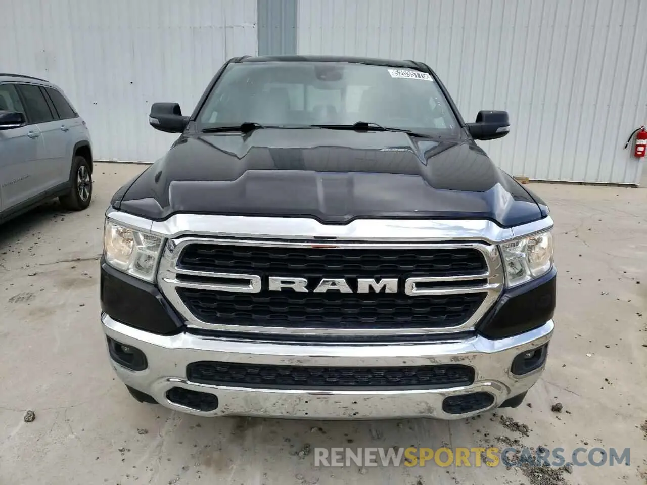 5 Photograph of a damaged car 1C6RREFT1PN543681 RAM 1500 2023