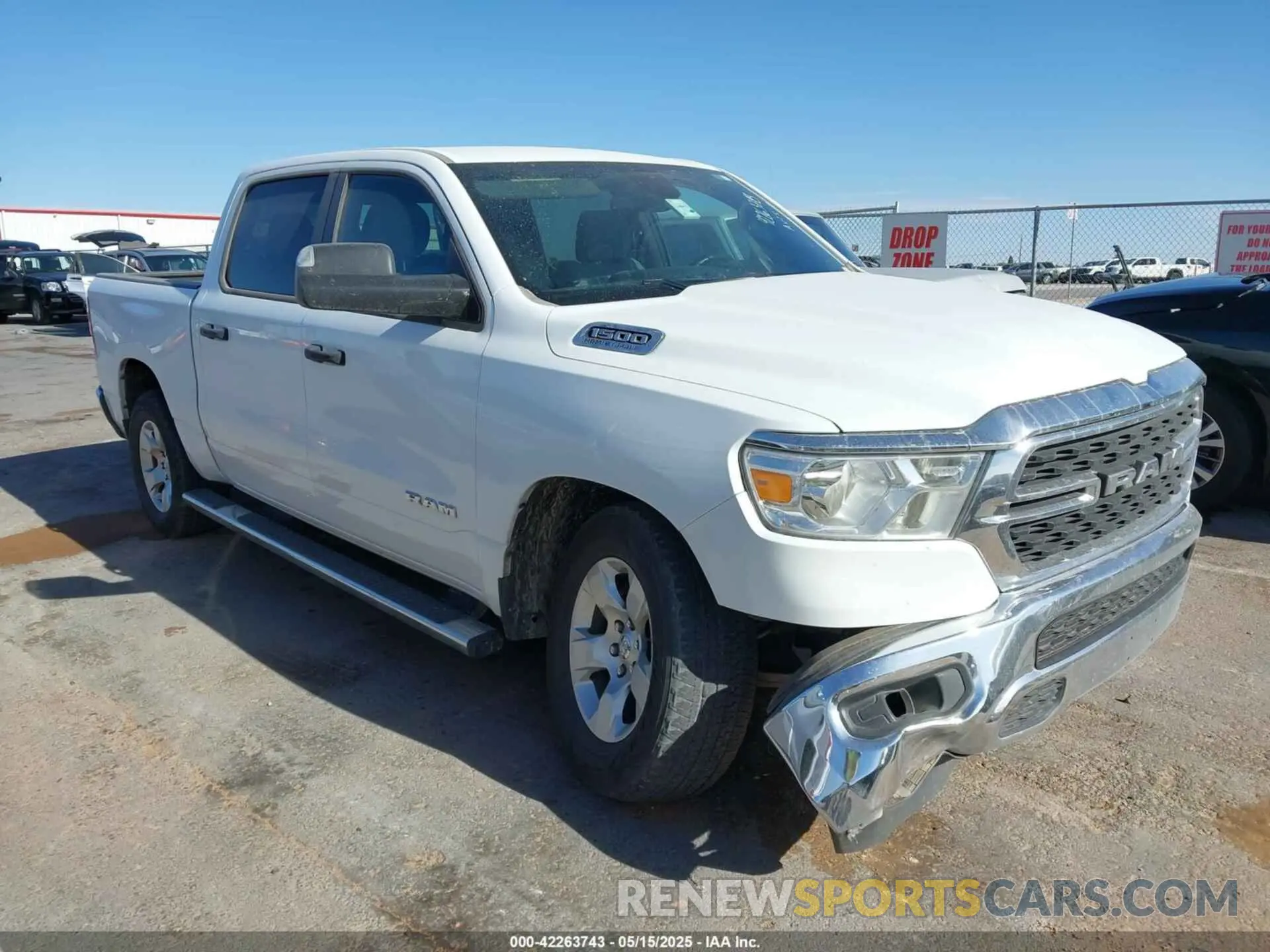 13 Photograph of a damaged car 1C6RREFT1PN693046 RAM 1500 2023