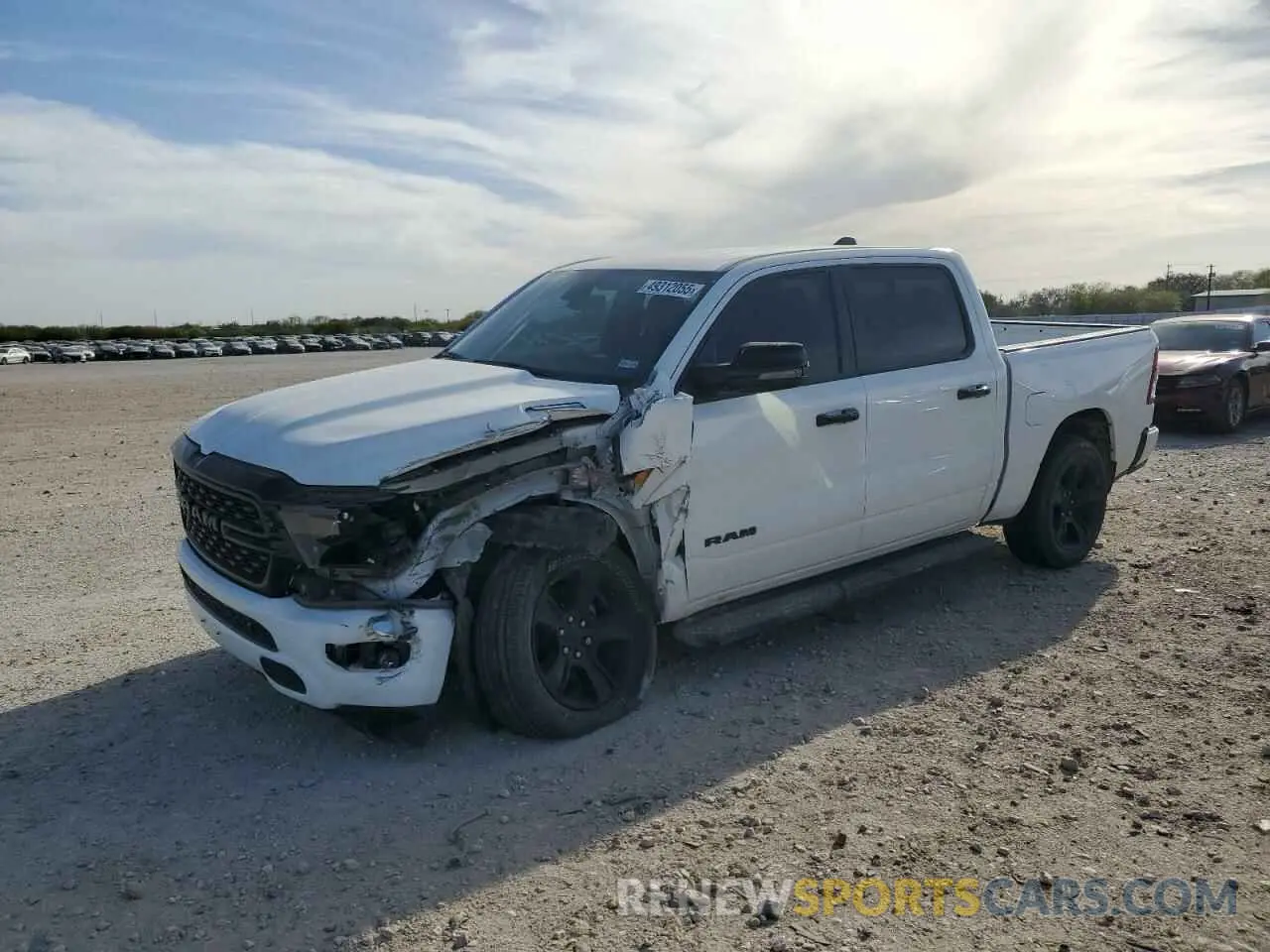 1 Photograph of a damaged car 1C6RREFT2PN585566 RAM 1500 2023