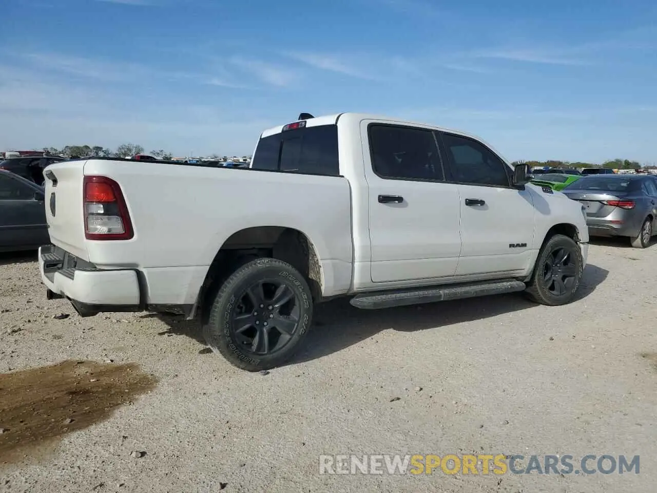 3 Photograph of a damaged car 1C6RREFT2PN585566 RAM 1500 2023