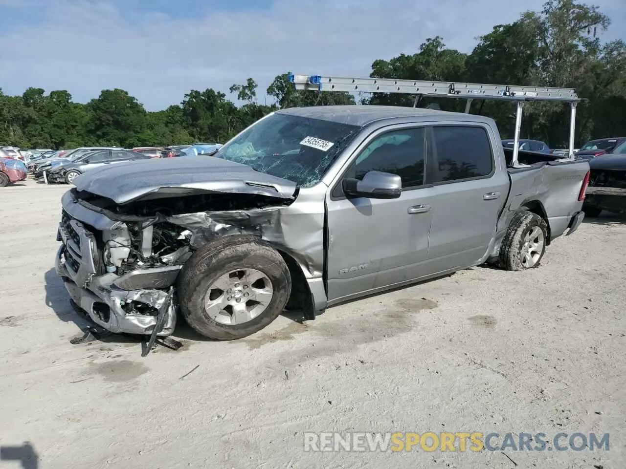 1 Photograph of a damaged car 1C6RREFT5PN579311 RAM 1500 2023