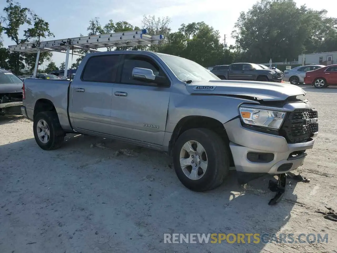 4 Photograph of a damaged car 1C6RREFT5PN579311 RAM 1500 2023