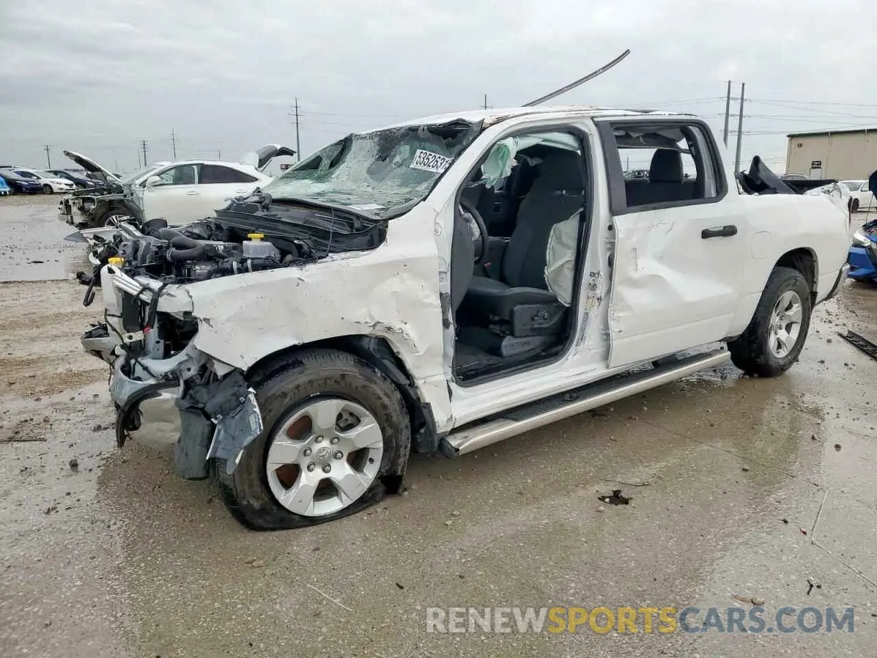 1 Photograph of a damaged car 1C6RREFT5PN600450 RAM 1500 2023