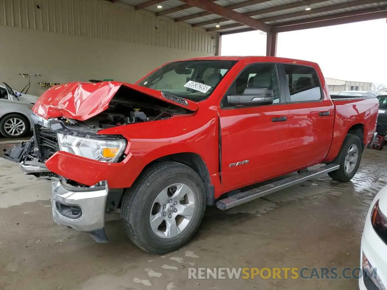 1 Photograph of a damaged car 1C6RREFT5PN607317 RAM 1500 2023