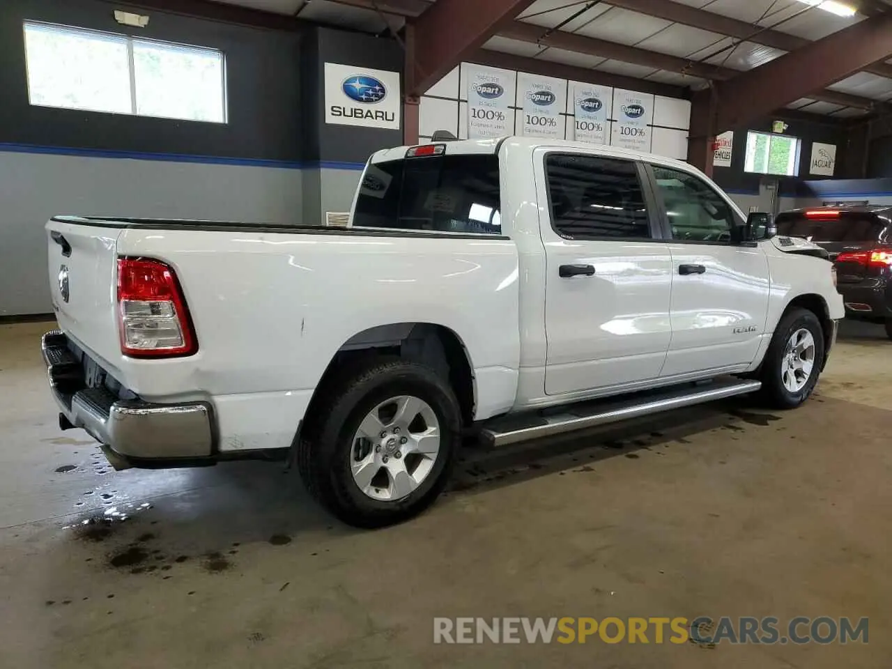 3 Photograph of a damaged car 1C6RREFT7PN614348 RAM 1500 2023