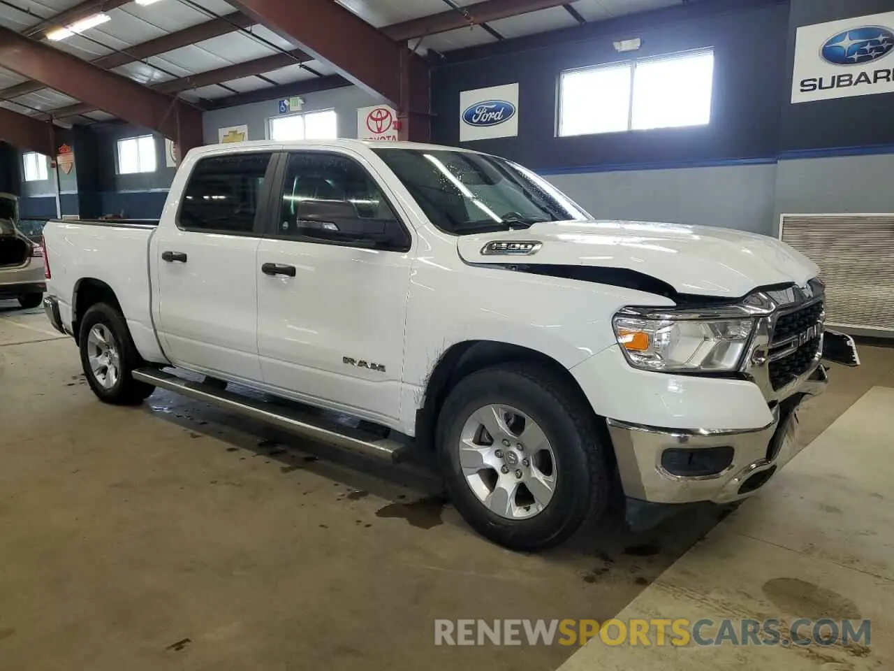 4 Photograph of a damaged car 1C6RREFT7PN614348 RAM 1500 2023