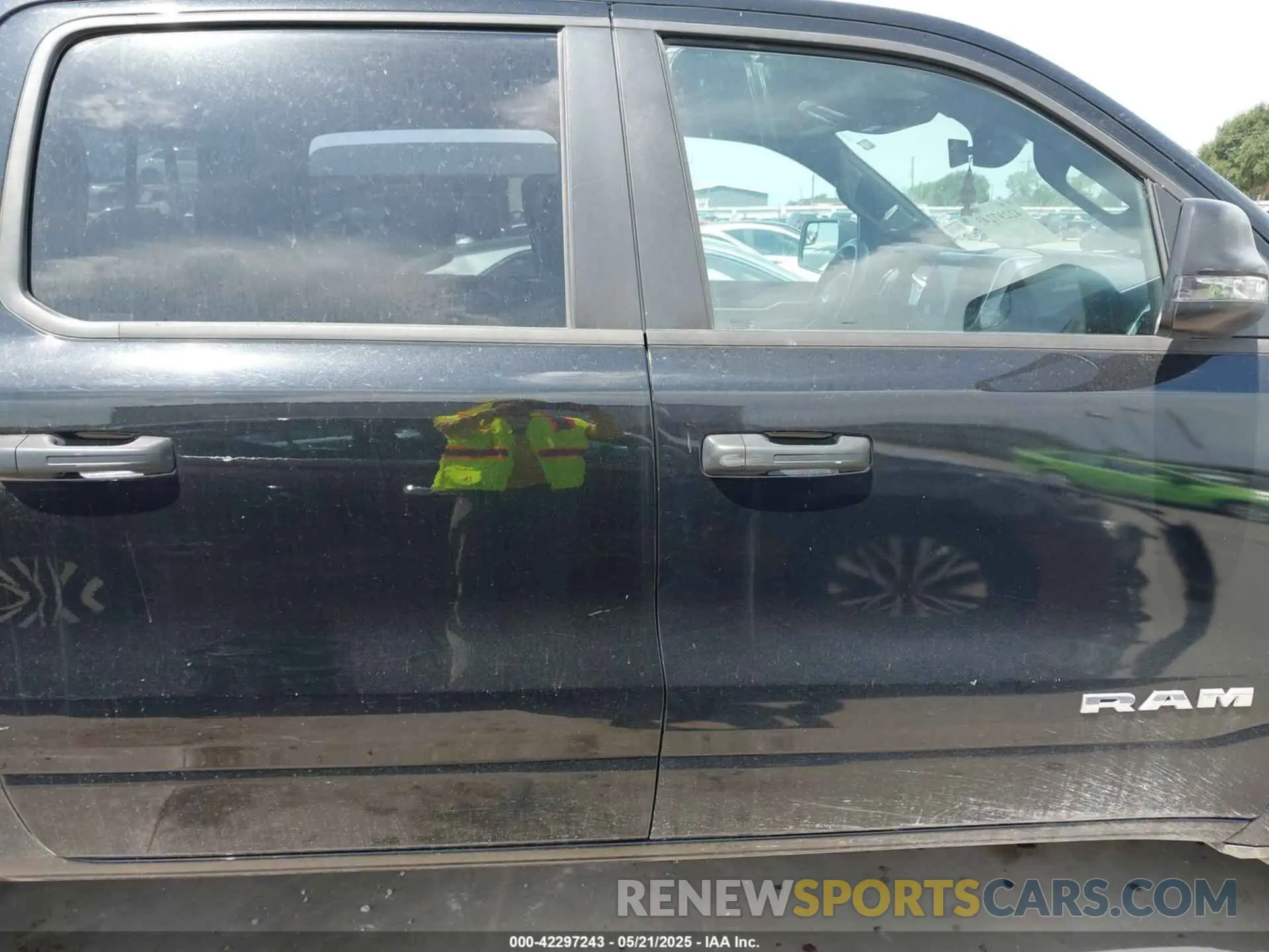 13 Photograph of a damaged car 1C6RREFTXPN534591 RAM 1500 2023