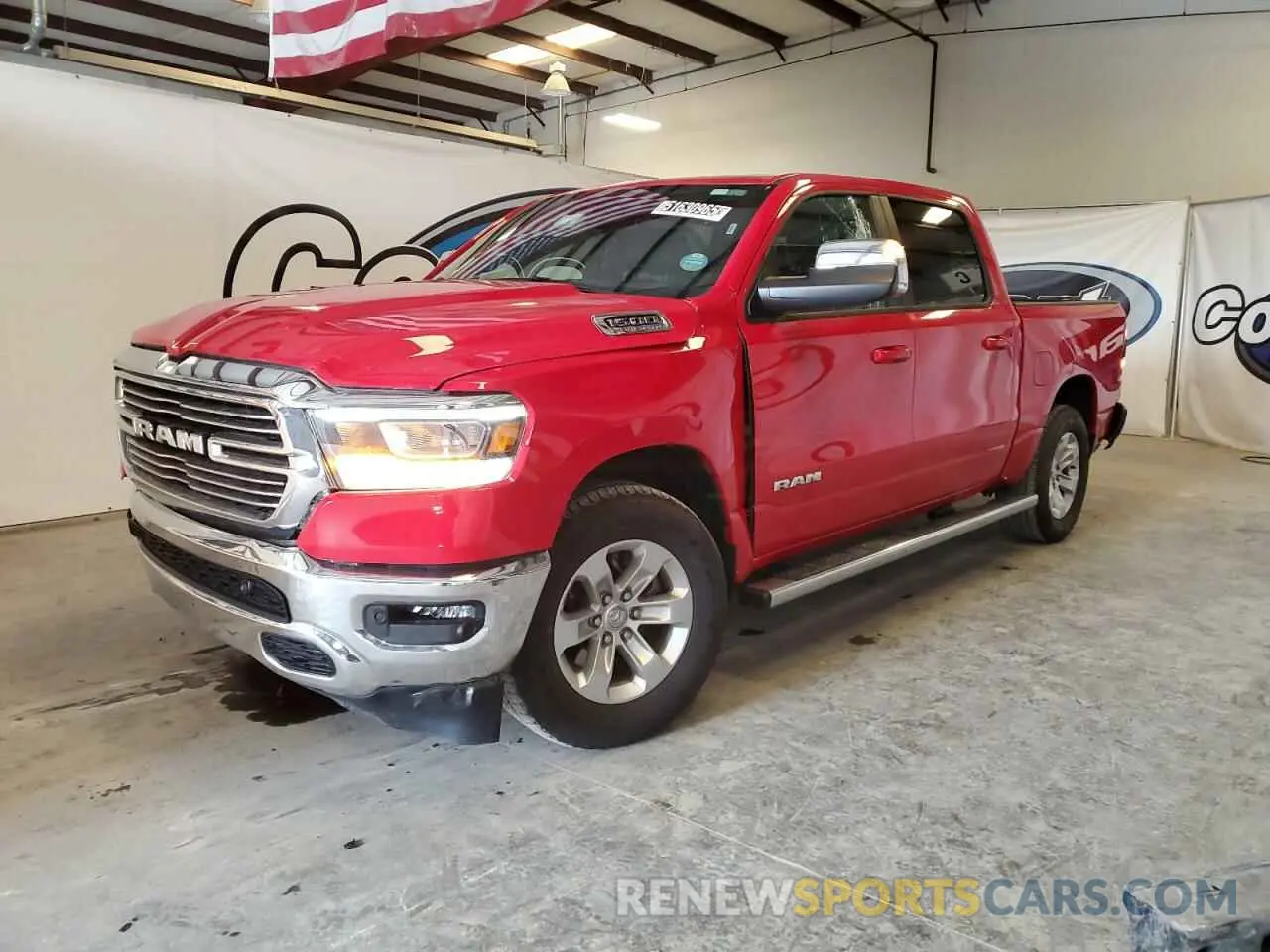 1 Photograph of a damaged car 1C6RREJTXPN676723 RAM 1500 2023