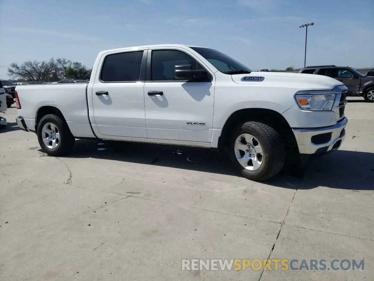 4 Photograph of a damaged car 1C6RREMT5PN604002 RAM 1500 2023
