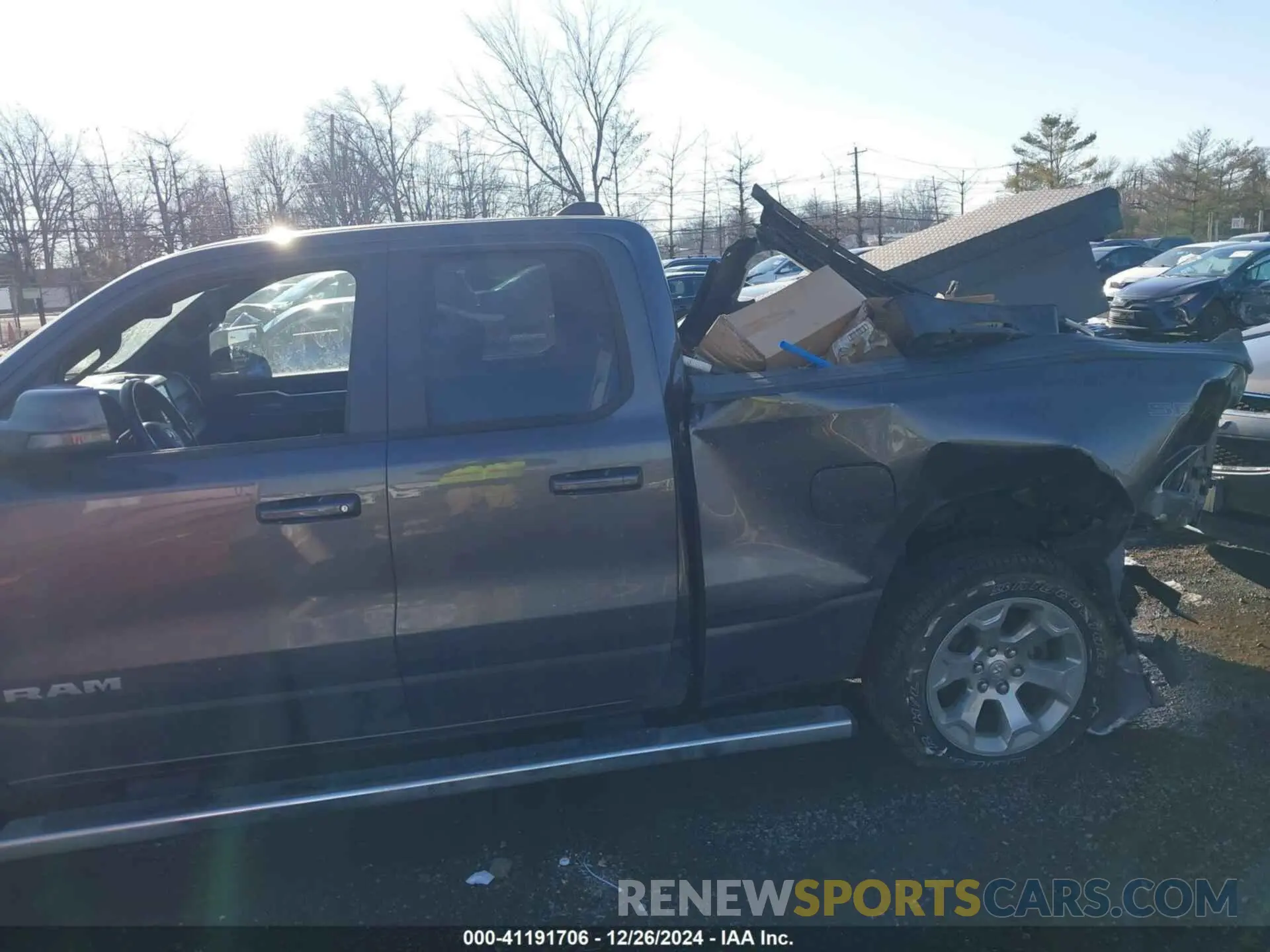 13 Photograph of a damaged car 1C6RRFBG0PN583930 RAM 1500 2023