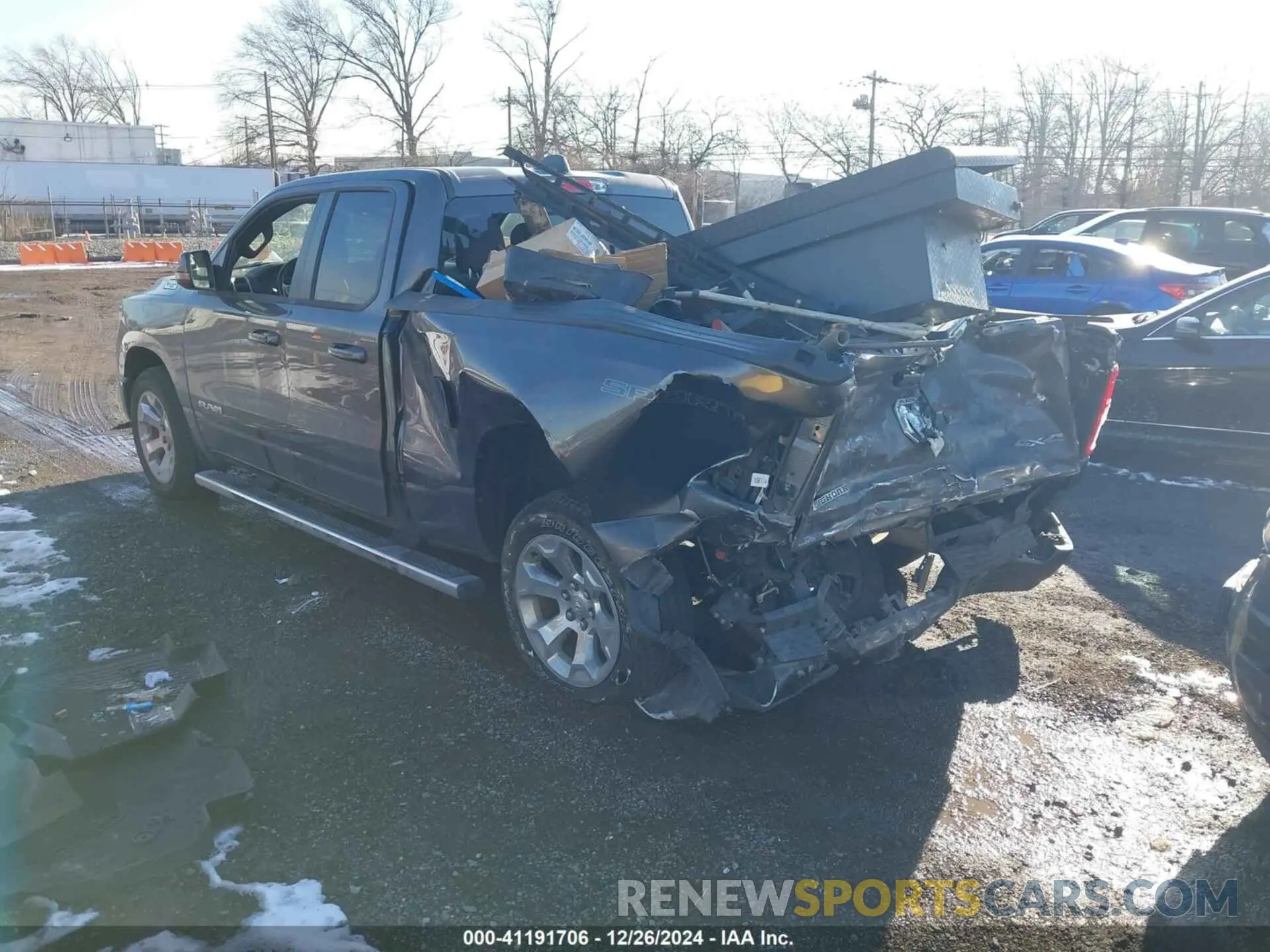 3 Photograph of a damaged car 1C6RRFBG0PN583930 RAM 1500 2023