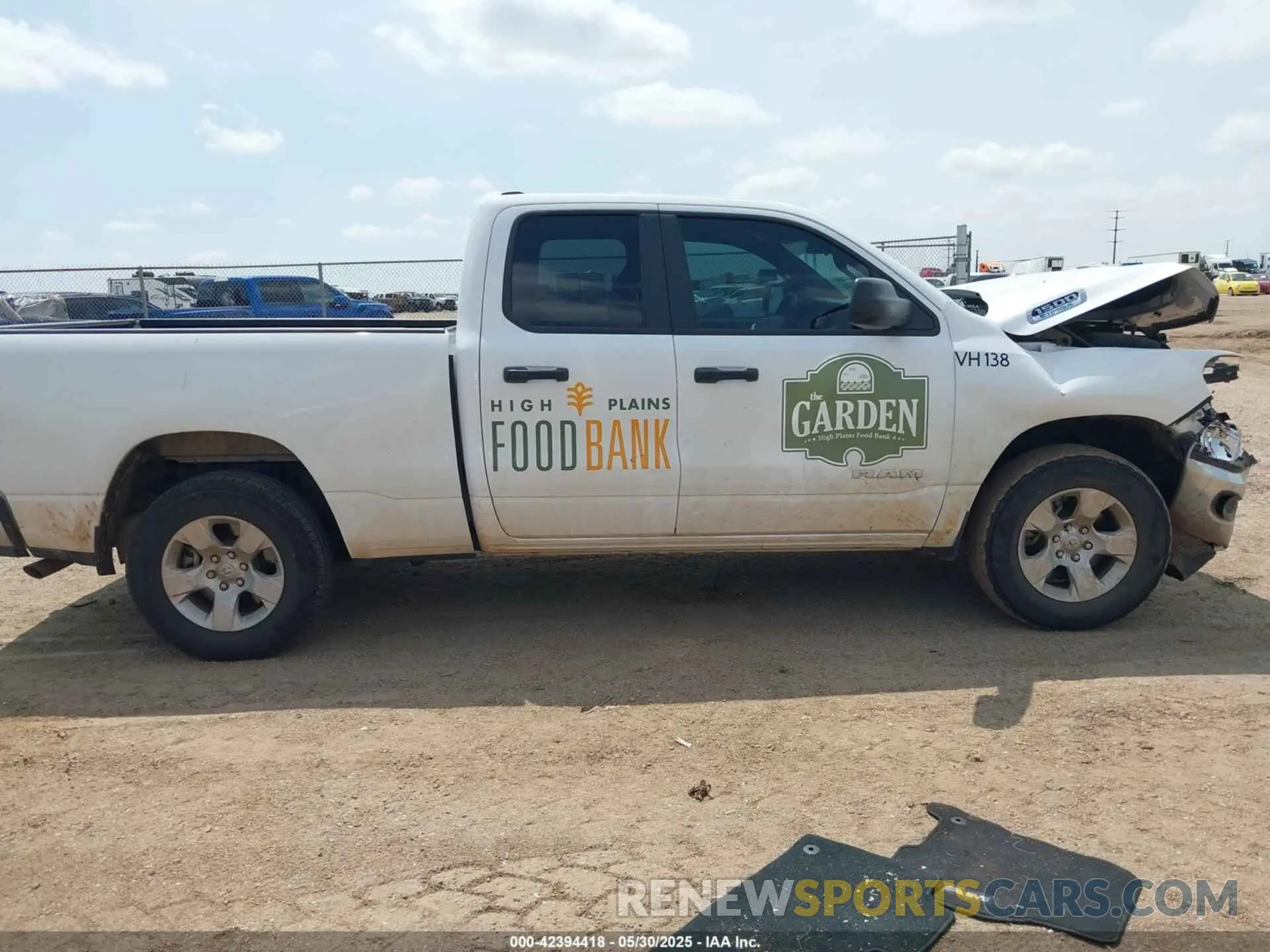 14 Photograph of a damaged car 1C6RRFBG4PN599435 RAM 1500 2023