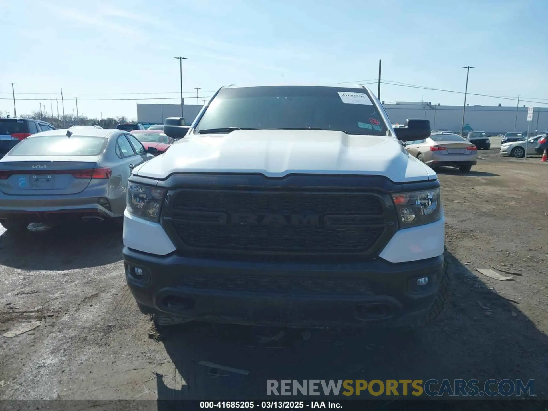 12 Photograph of a damaged car 1C6RRFCG3PN677878 RAM 1500 2023