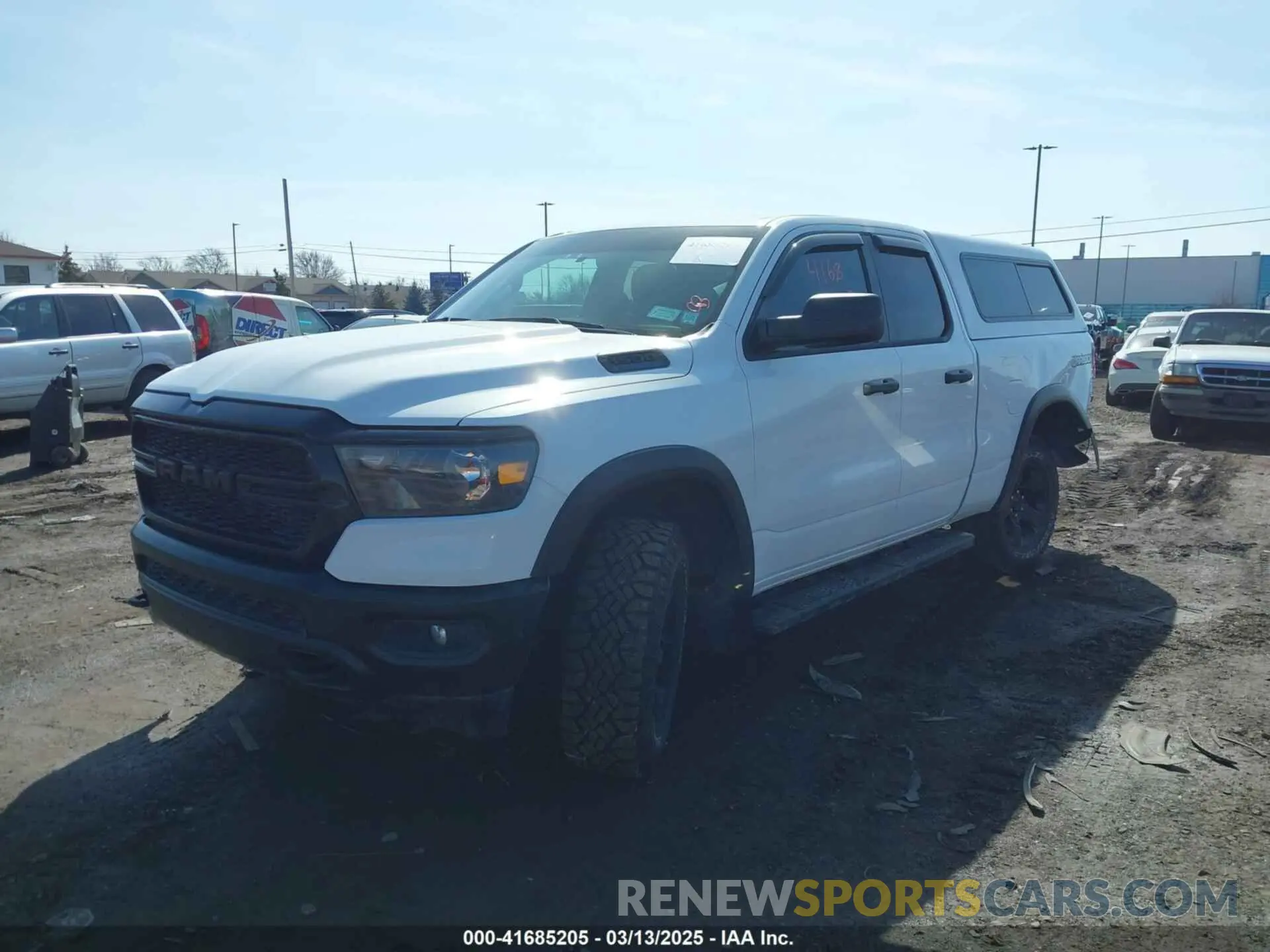 2 Photograph of a damaged car 1C6RRFCG3PN677878 RAM 1500 2023