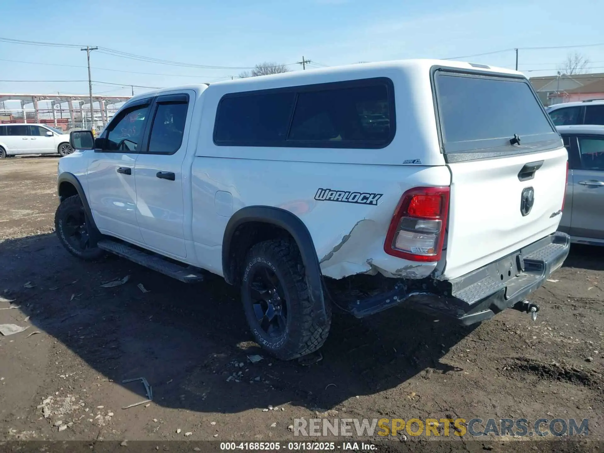 3 Photograph of a damaged car 1C6RRFCG3PN677878 RAM 1500 2023