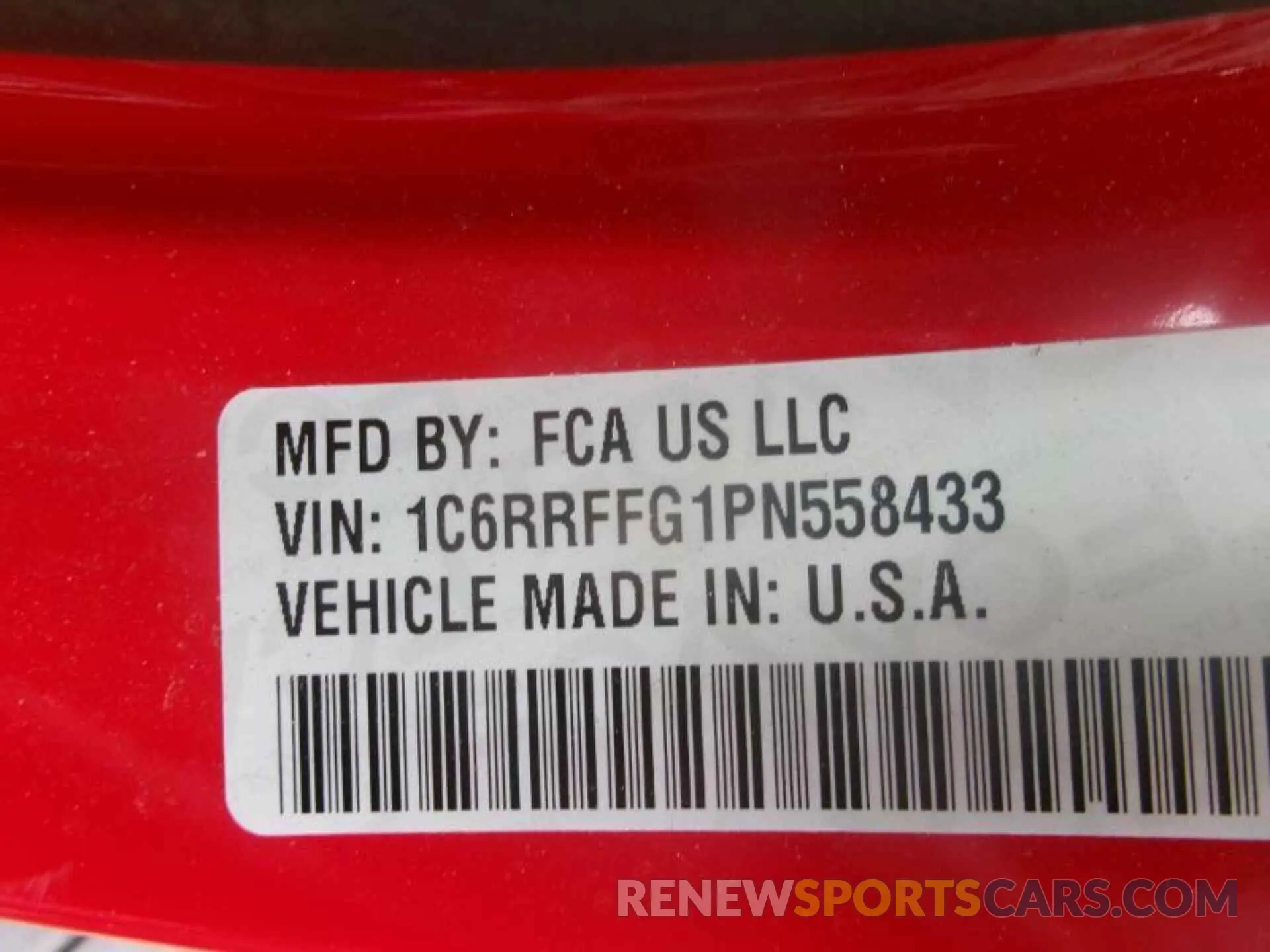 13 Photograph of a damaged car 1C6RRFFG1PN558433 RAM 1500 2023