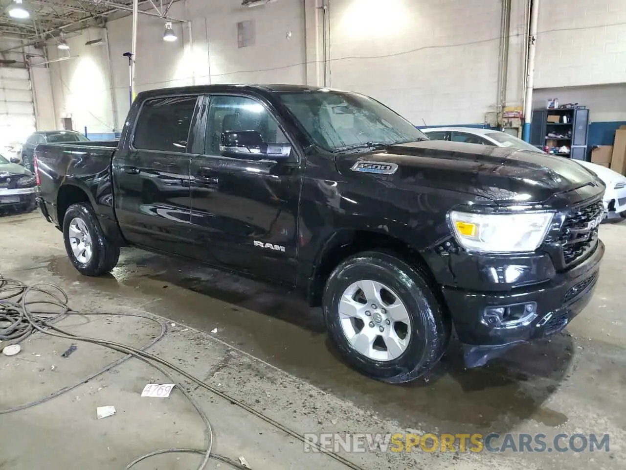 4 Photograph of a damaged car 1C6RRFFG1PN579069 RAM 1500 2023