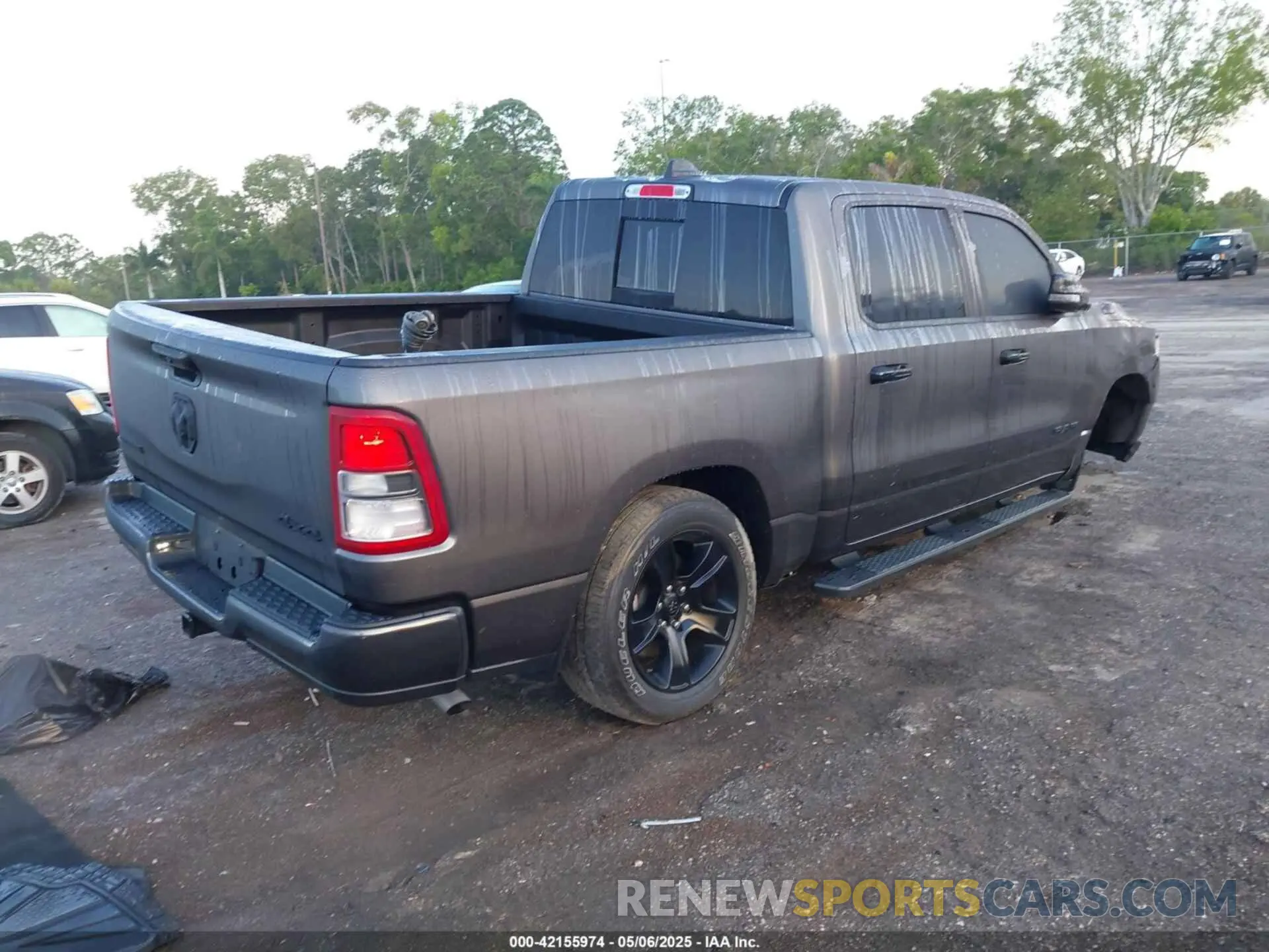 4 Photograph of a damaged car 1C6RRFFG1PN644440 RAM 1500 2023