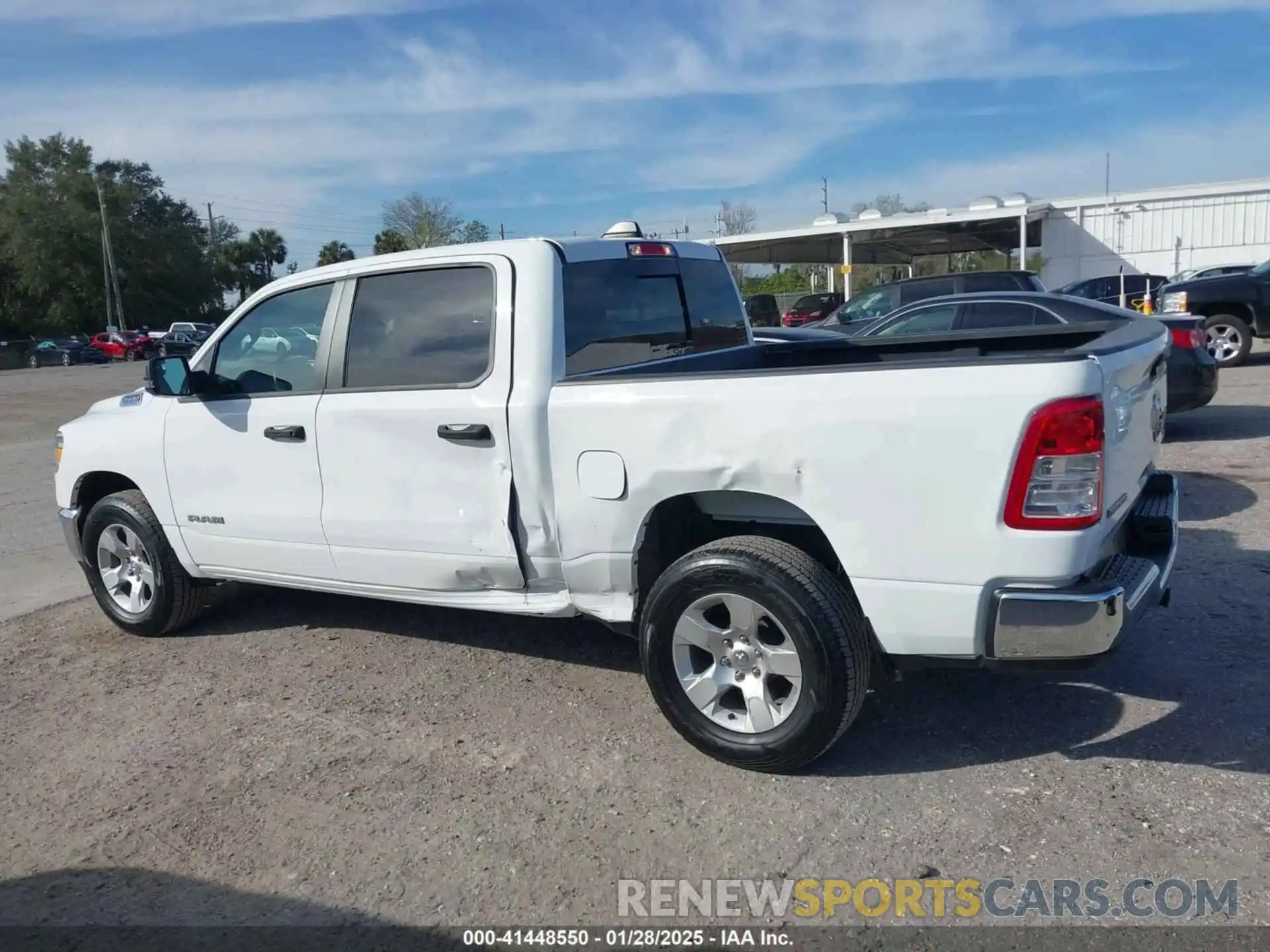 14 Photograph of a damaged car 1C6RRFFG2PN560904 RAM 1500 2023