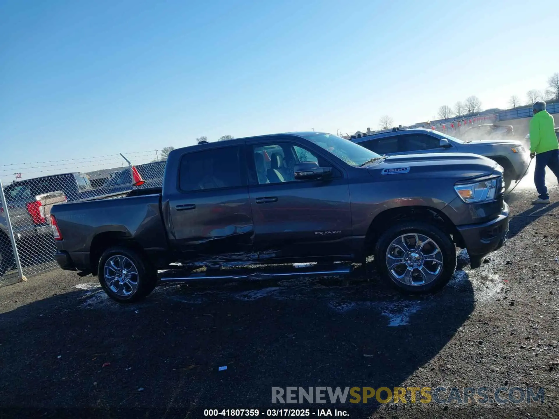 13 Photograph of a damaged car 1C6RRFFG2PN599704 RAM 1500 2023