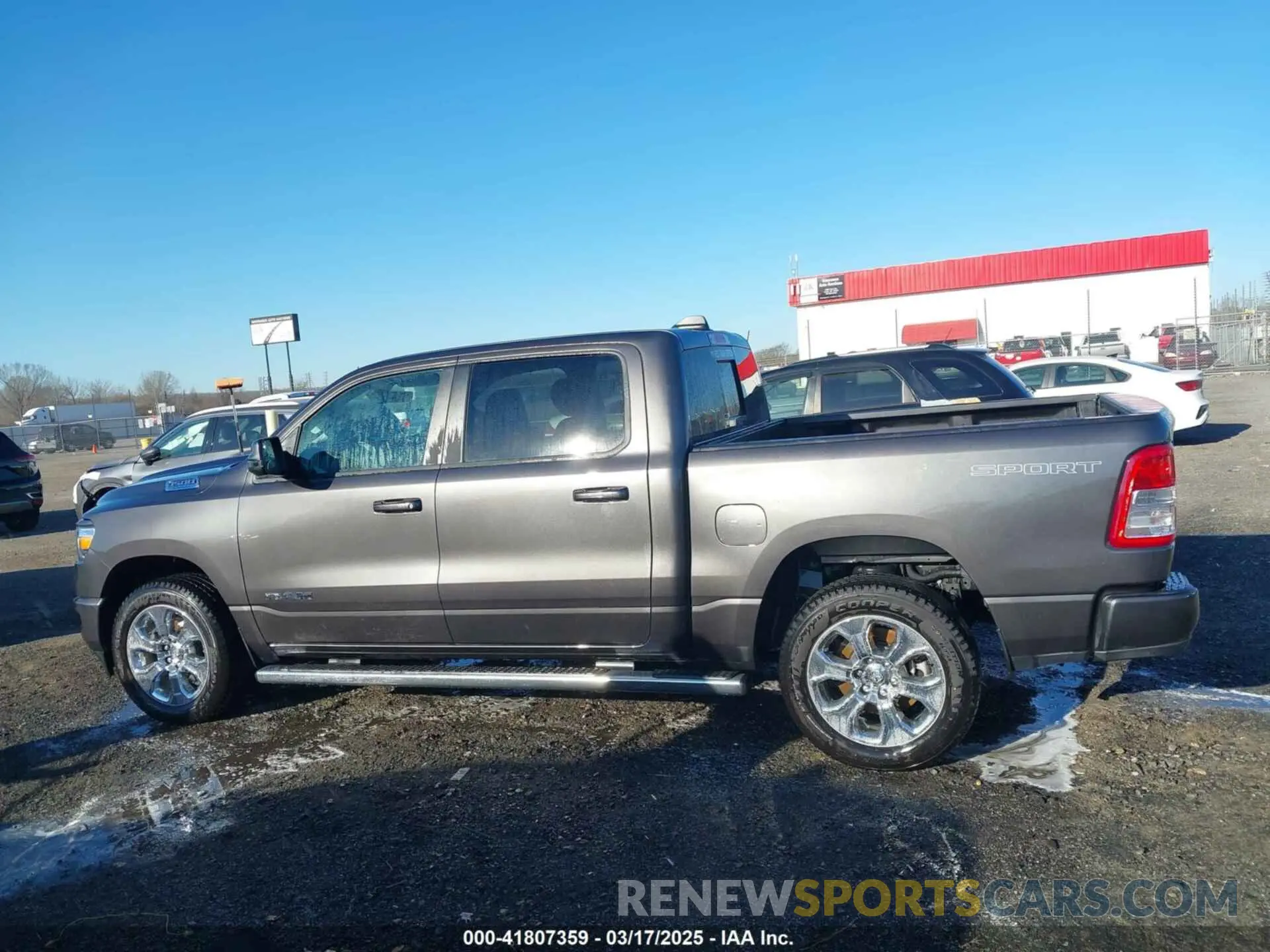 14 Photograph of a damaged car 1C6RRFFG2PN599704 RAM 1500 2023