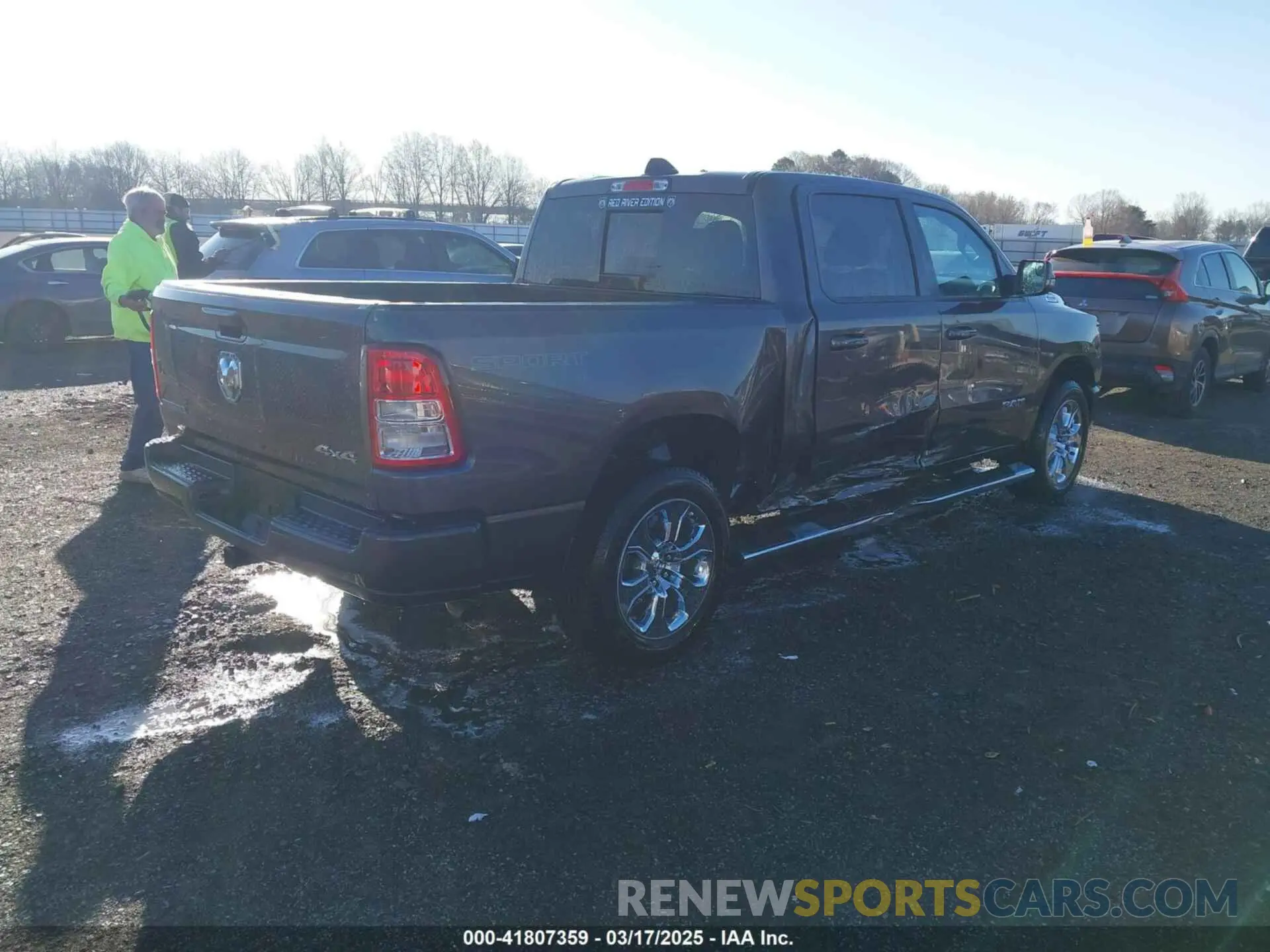 4 Photograph of a damaged car 1C6RRFFG2PN599704 RAM 1500 2023