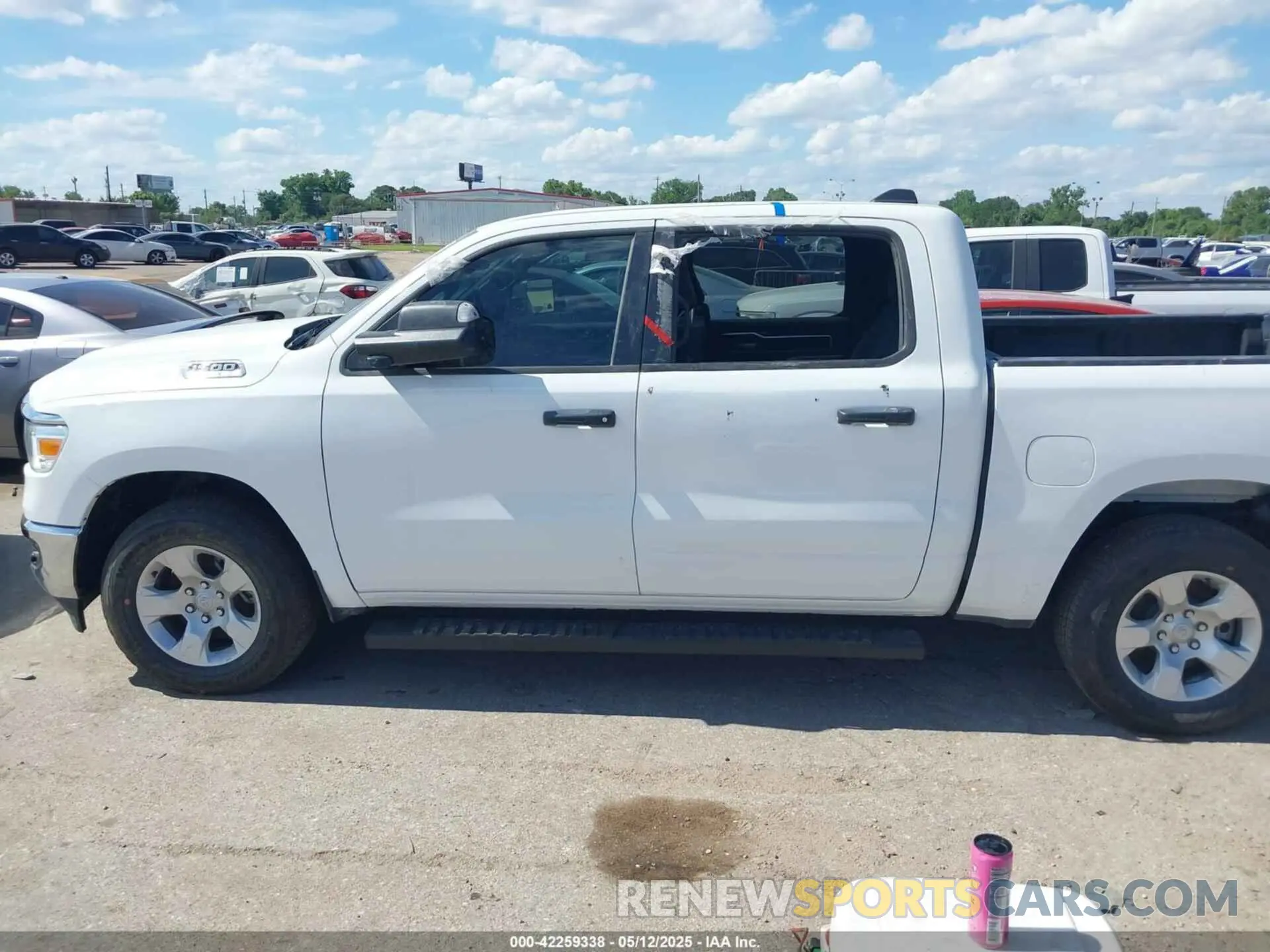 14 Photograph of a damaged car 1C6RRFFG2PN649047 RAM 1500 2023