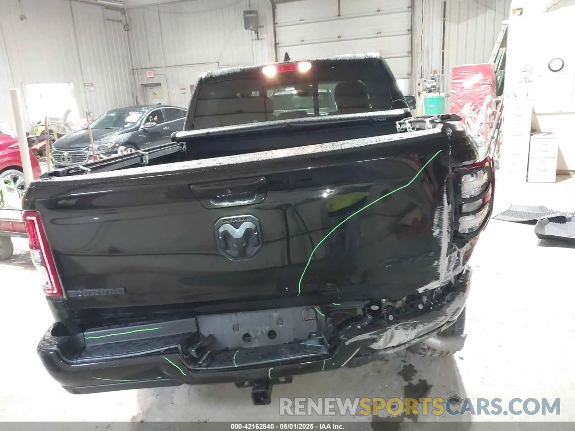16 Photograph of a damaged car 1C6RRFFG3PN591272 RAM 1500 2023
